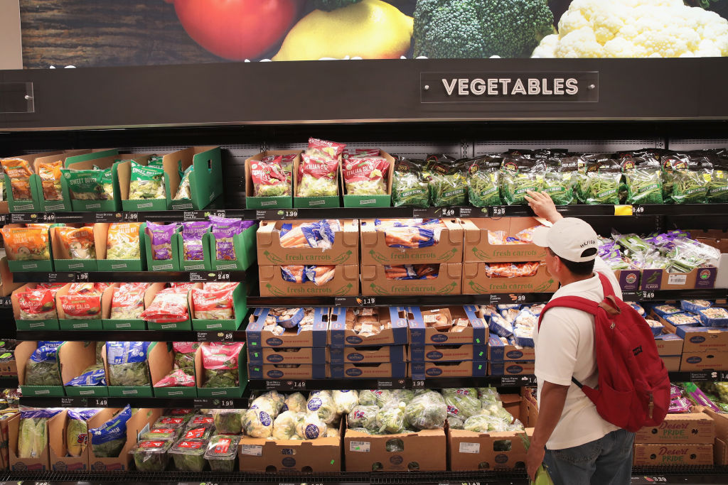 CHICAGO, IL - JUNE 12: Customers shop at an Aldi grocery store on June 12, 2017 in Chicago, Illinois. Aldi has announced plans to open 900 new stores in the United States in the next five years. The $3.4 billion capital investment would create 25,000 jobs and make the grocery chain the third largest in the nation behind Wal-Mart and Kroger. (Photo by Scott Olson/Getty Images)