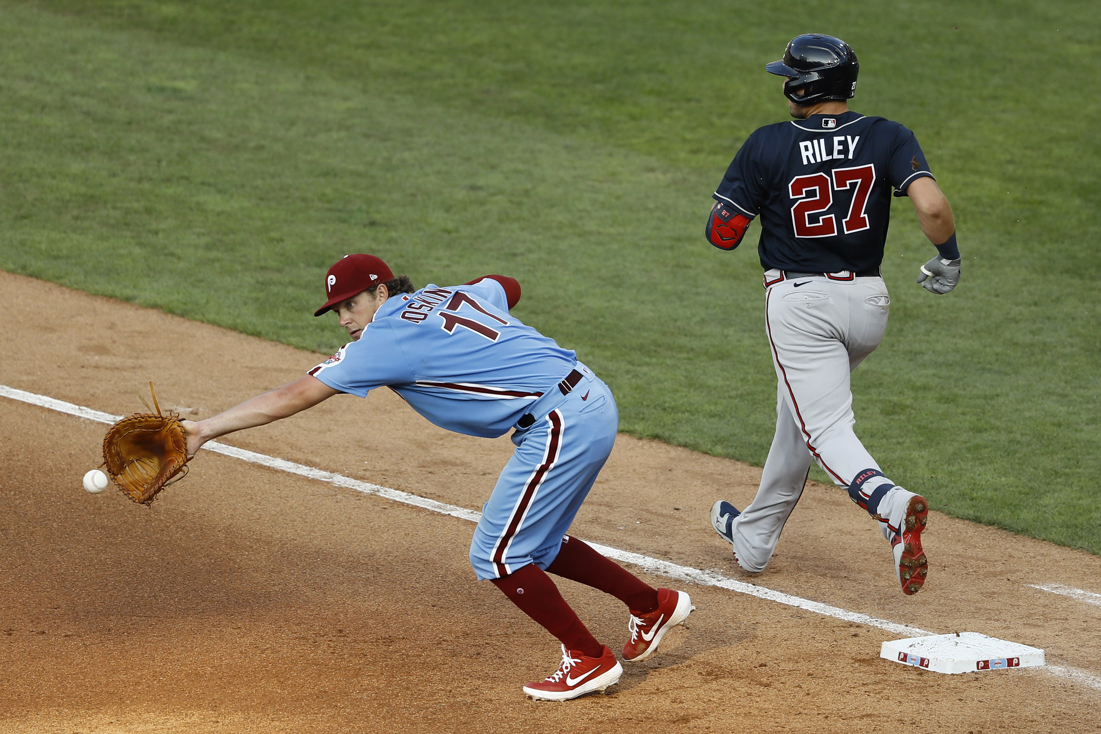 Huascar Ynoa and Tyler Flowers of the Atlanta Braves walk toward