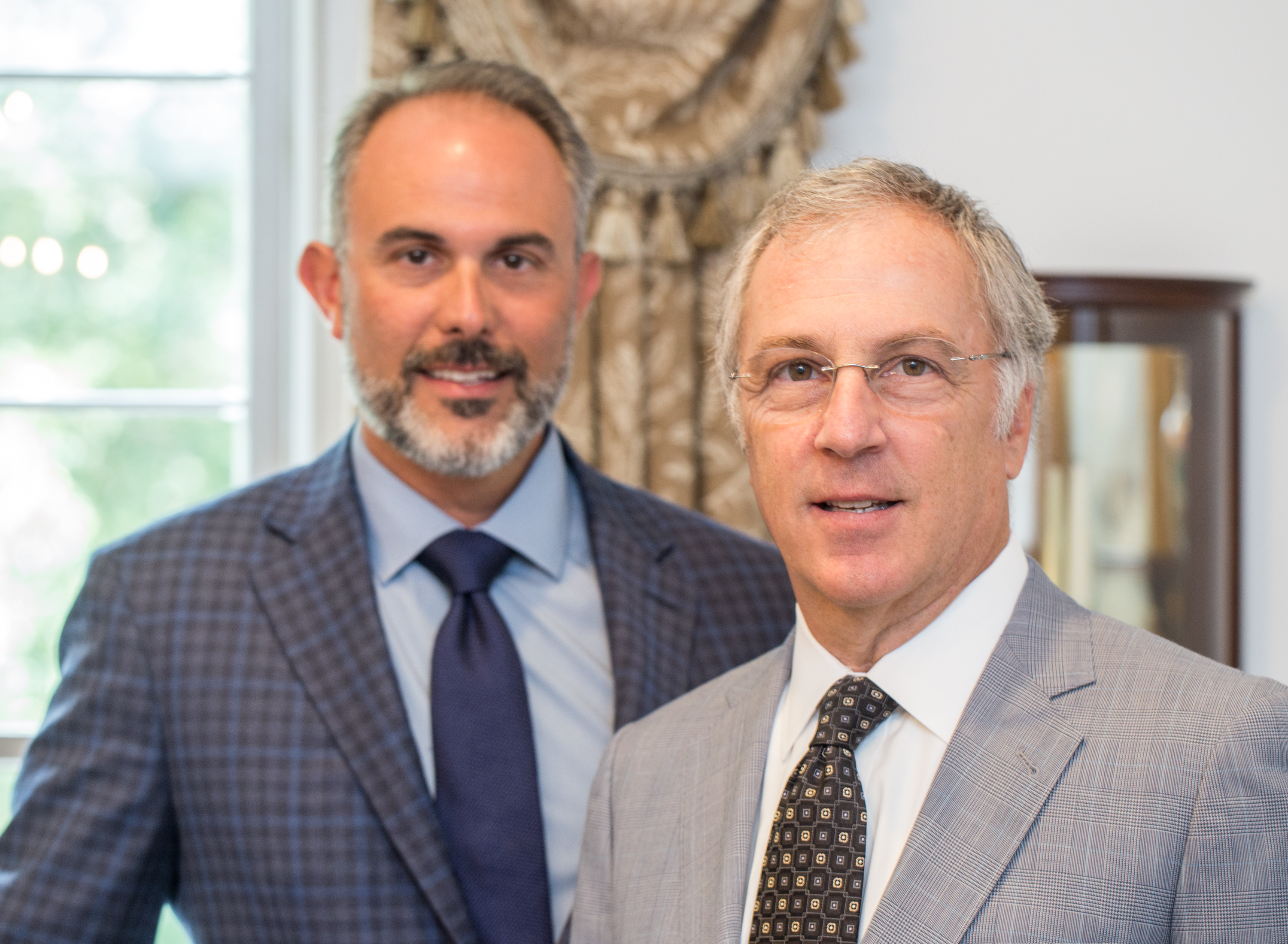 Jason Sheffield, left, and Bob Rubin, right, are the attorneys representing Travis McMichael, who is charged with the murder of Ahmaud Arbery. (Jenni Girtman for The Atlanta Journal-Constitution)