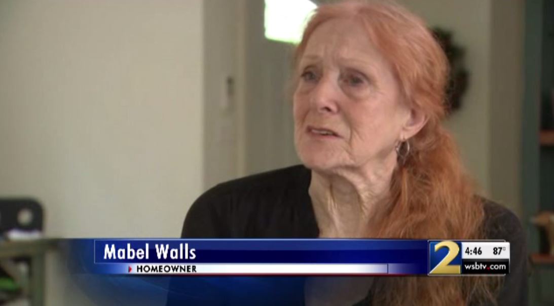 DeKalb homeowner Mabel Walls tears up while talking about her mail carrier saving her life.