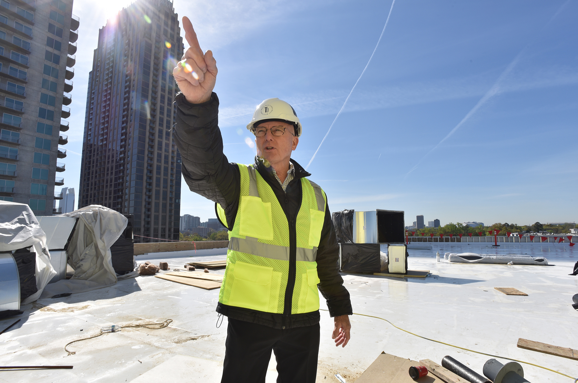 John Heagy, senior managing director for Hines Southeast Region, speaks on the rooftop of the T3 West Midtown construction site at Atlantic Station. T3 doesn’t yet have signed tenants, but Heagy expects announcements soon. Financial technology companies, law firms and creative companies are on the target list.