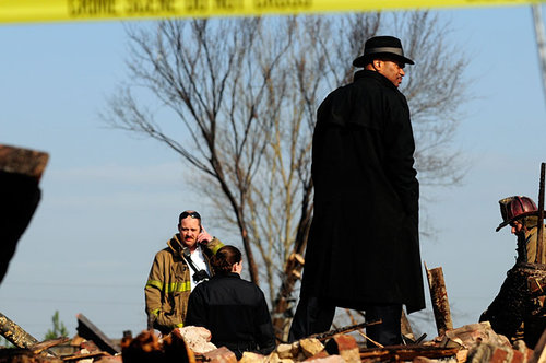 Atlanta police Lt. Keith Meadows, commander of the department's homicide unit, inspects the scene.