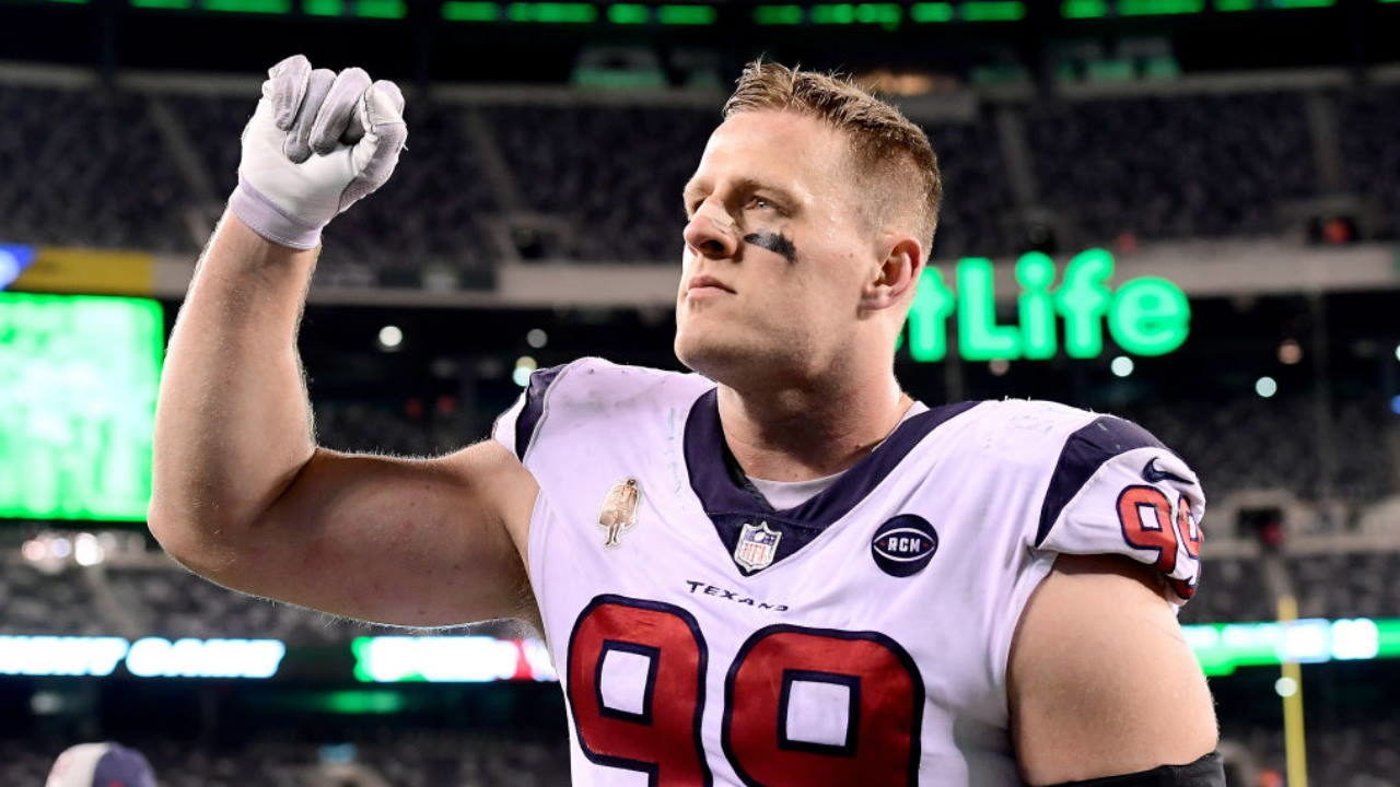 Texans star J.J. Watt rides kid's bike to joint practice with Packers,  breaks seat