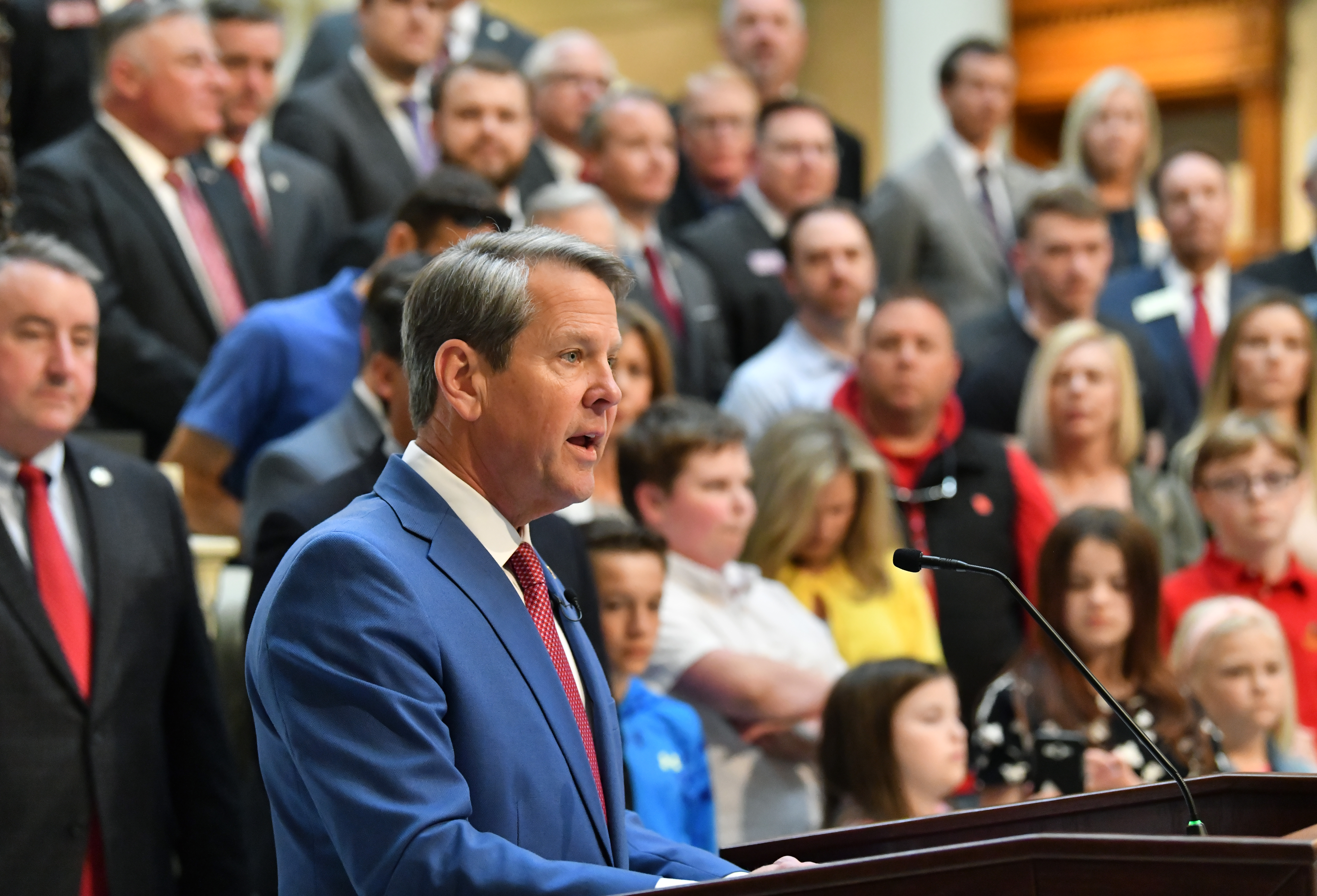 Gov. Brian Kemp speaks before he signs legislation that allows parents who don’t want their children wearing masks to opt out of any school district mandates at the Georgia State Capitol on Tuesday, March 29, 2022. Gov. Brian Kemp on Tuesday (Hyosub Shin / Hyosub.Shin@ajc.com)