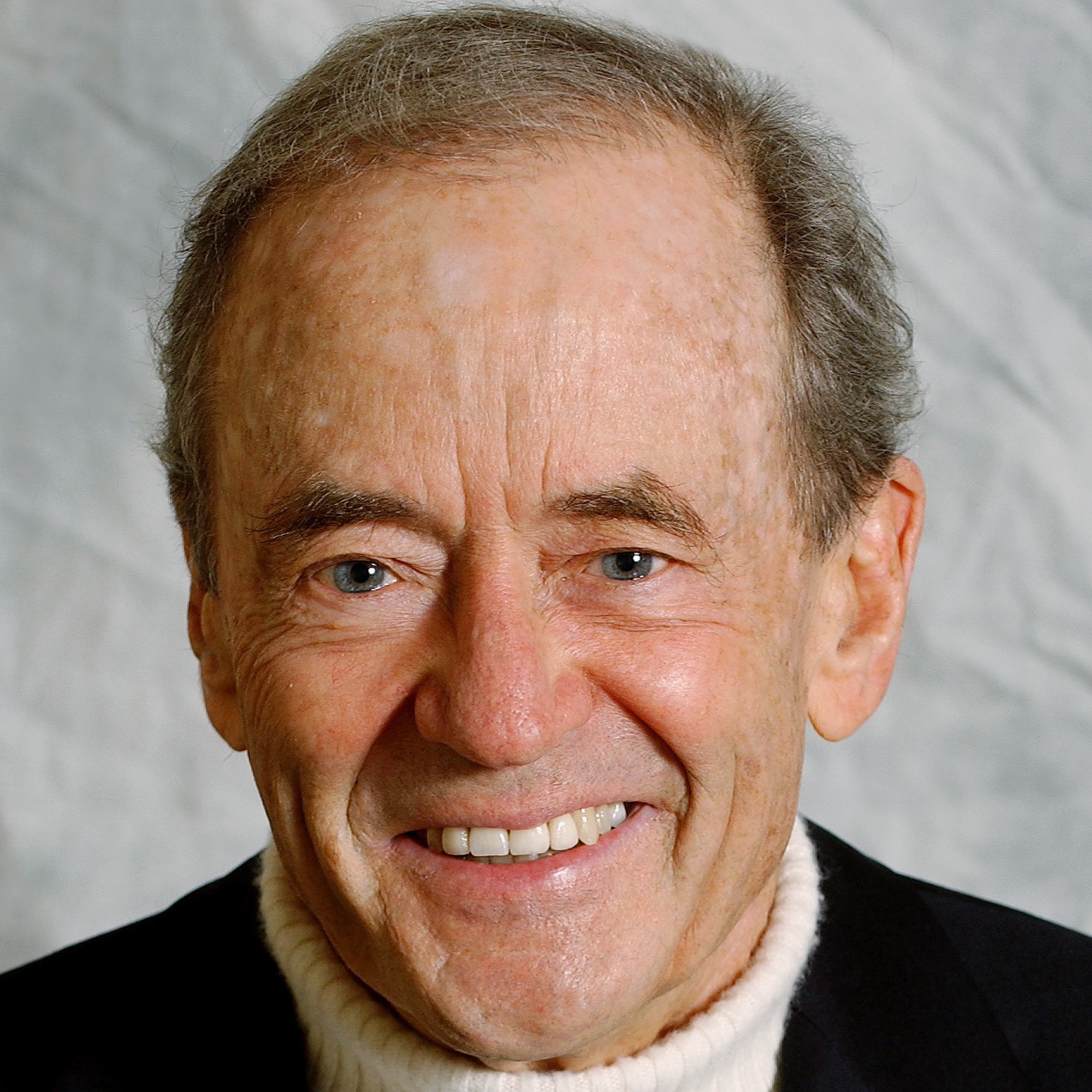 Michael Gearon Sr. poses for a portrait after a press conference announcing the closing of the sale of the Atlanta Hawks and Thrashers on March 31, 2004.