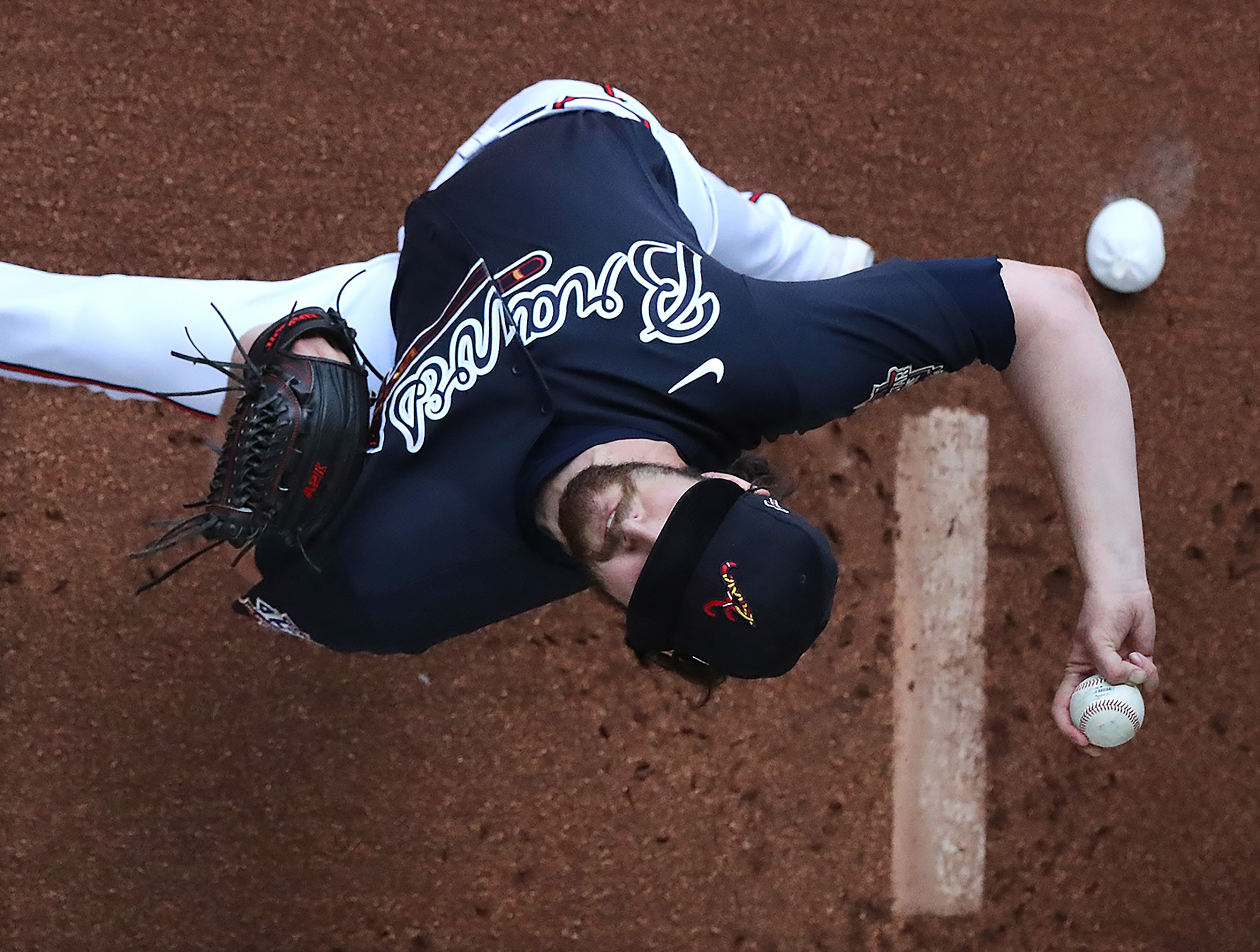 Braves pitcher Ian Anderson gets loose throwing in the bullpen before a spring training game at CoolToday Park on Tuesday, March 2, 2021. Curtis Compton / Curtis.Compton@ajc.com