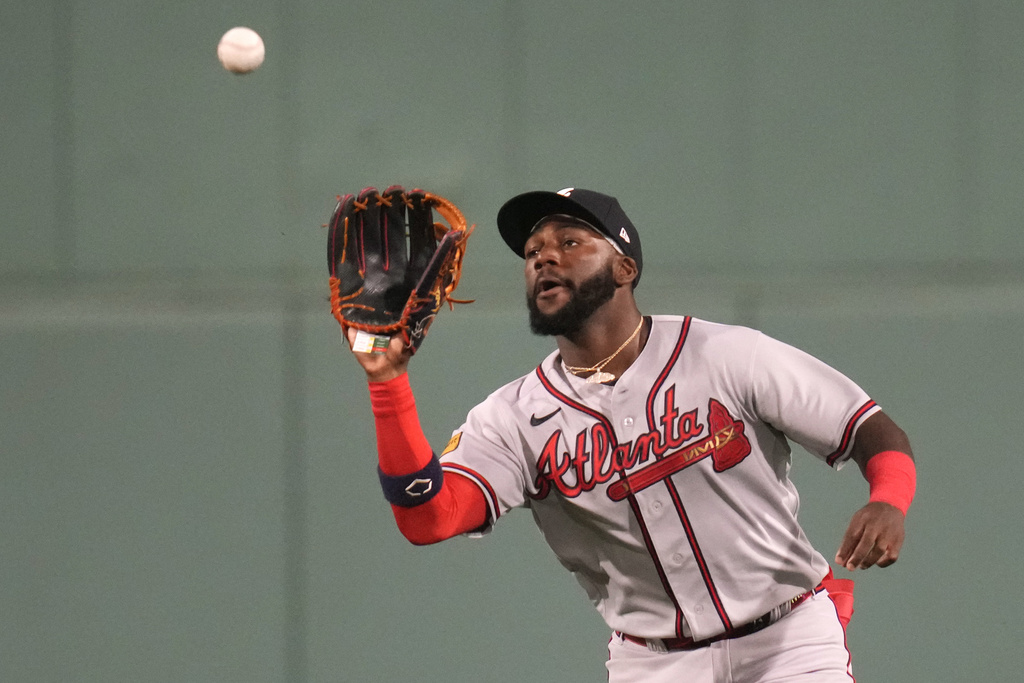 Neither wind, rain delay, nor triple play could derail the Red Sox in a  victory over the National League-leading Braves - The Boston Globe