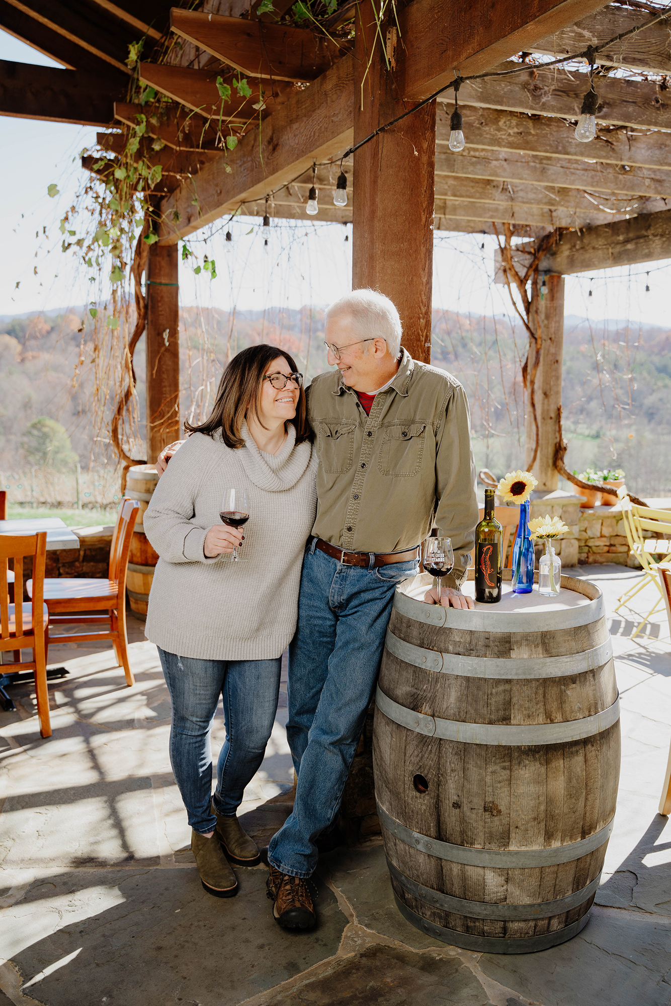 Eric and DeAnne Seifarth, owners of Crane Creek Vineyards, take a moment to enjoy the fruits of their labors.
(Courtesy of Crane Creek Vineyards.)