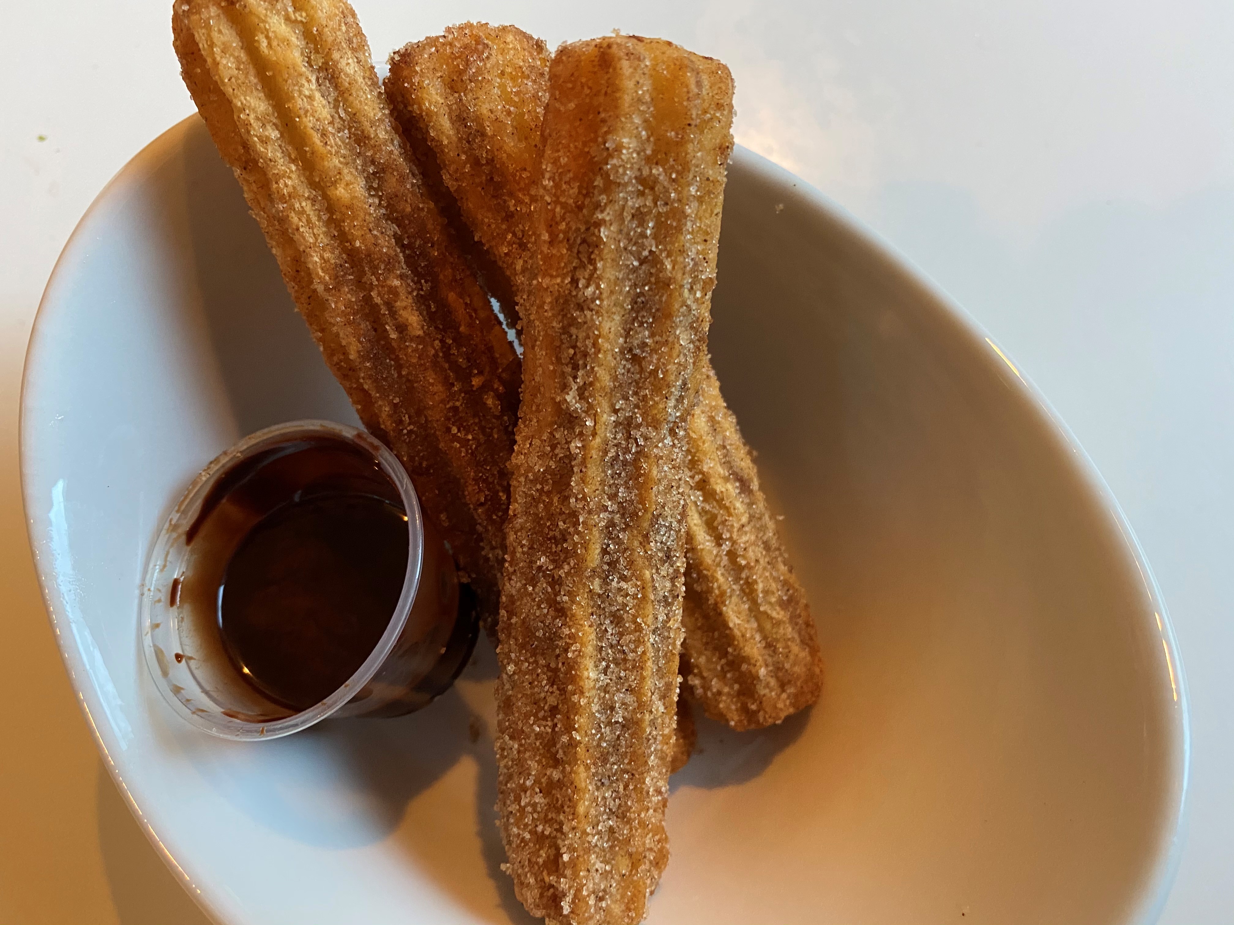 A favorite dessert at Taqueria el Tesoro is the churros, dusted with cinnamon sugar and dipped in Mexican-spice chocolate sauce. Bob Townsend for The Atlanta Journal-Constitution