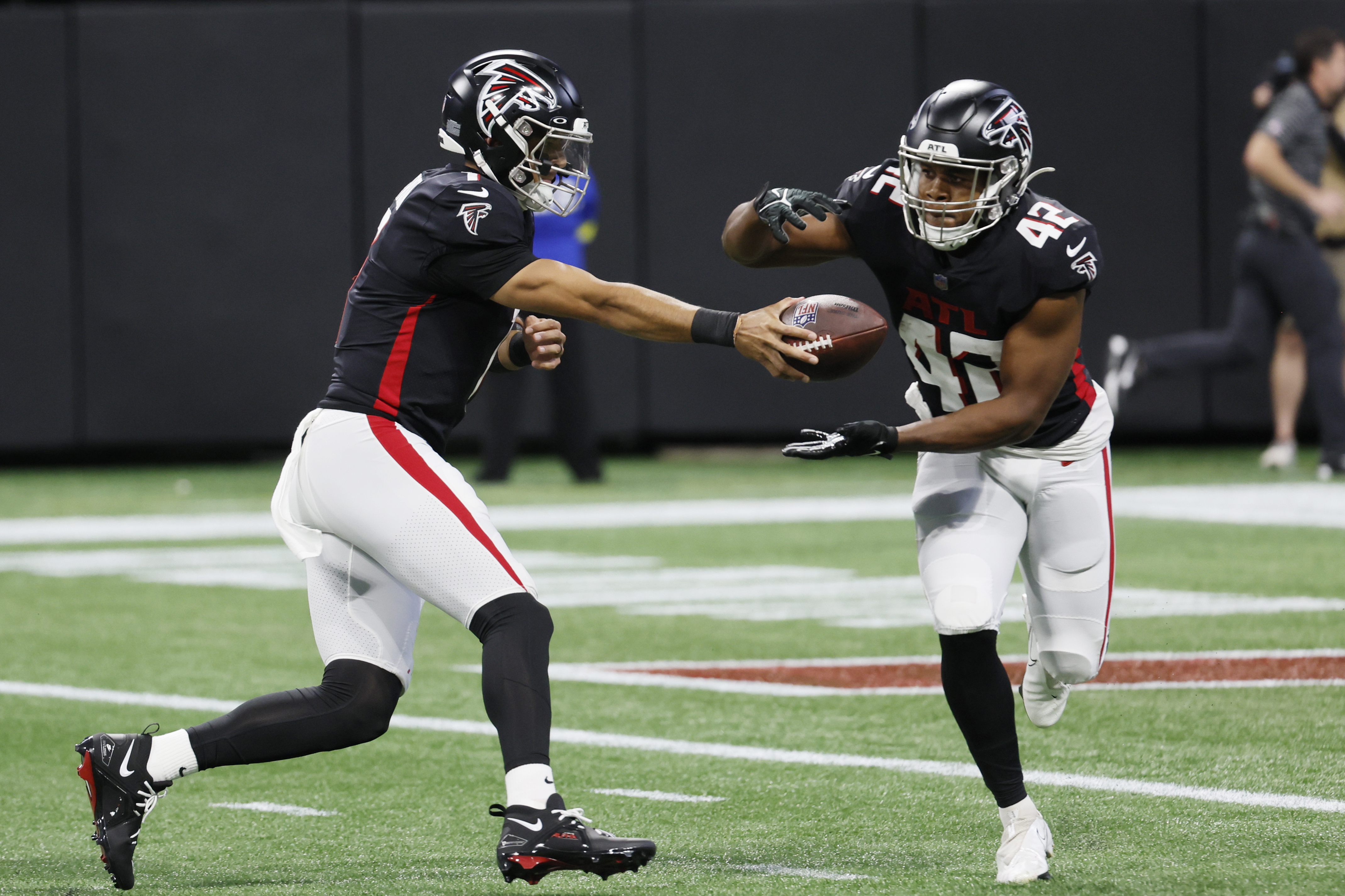 Atlanta Falcons safety Dean Marlowe (21) lines up during the second half of  an NFL football game against the Carolina Panthers, Sunday, Oct. 30, 2022,  in Atlanta. The Atlanta Falcons won 37-34. (