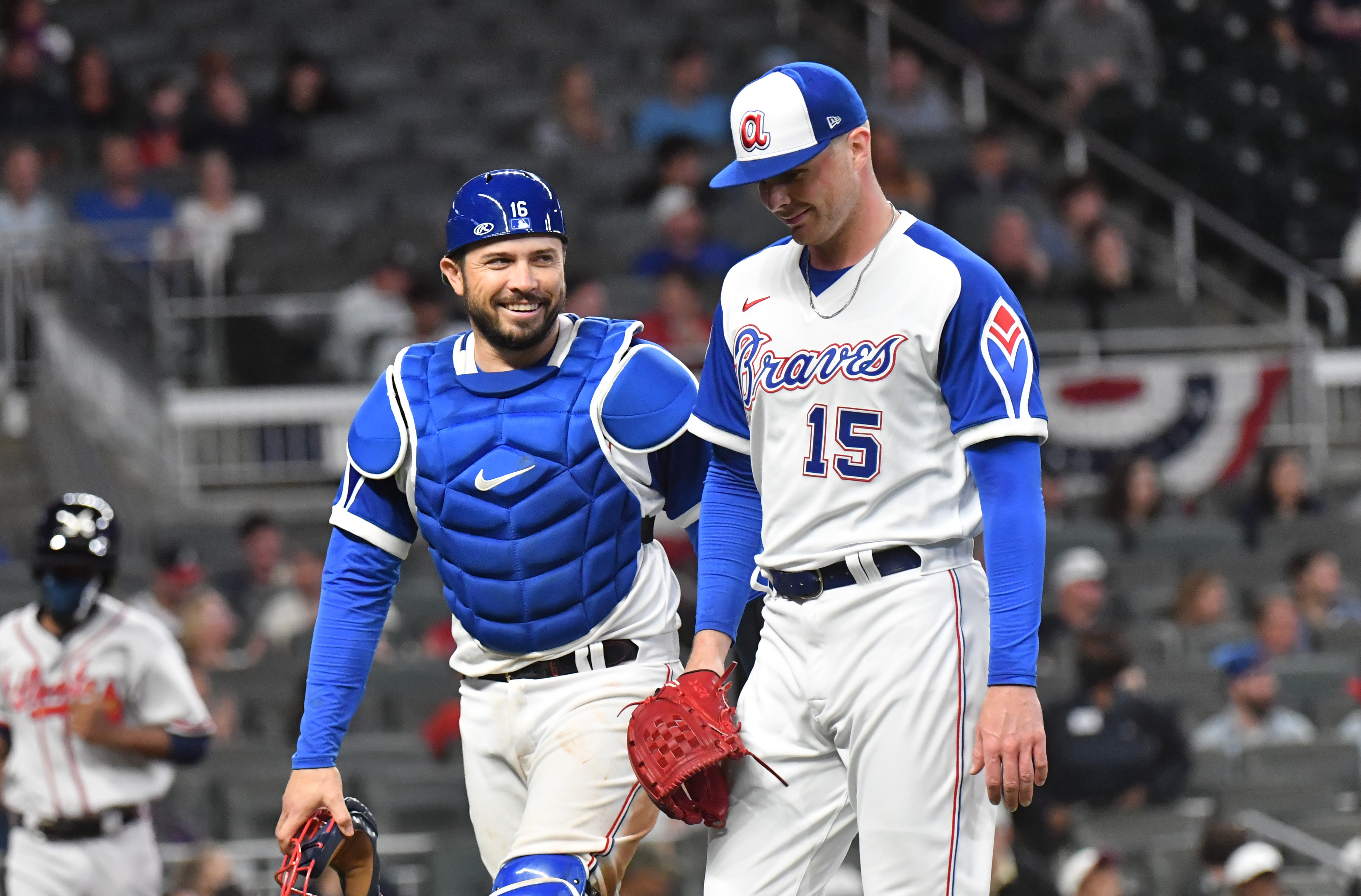 April 10, 2021 Atlanta - Atlanta Braves catcher Travis d'Arnaud (16) and pitcher Sean Newcomb (15) share a smile in the 6th inning at Truist Park on Saturday, April 10, 2021. Atlanta Braves won 5-4 over Philadelphia Phillies. (Hyosub Shin / Hyosub.Shin@ajc.com)