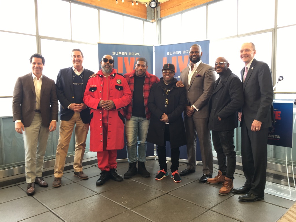 Jermaine Dupri, fourth from right, revealed some of the artists for Super Bowl Live.