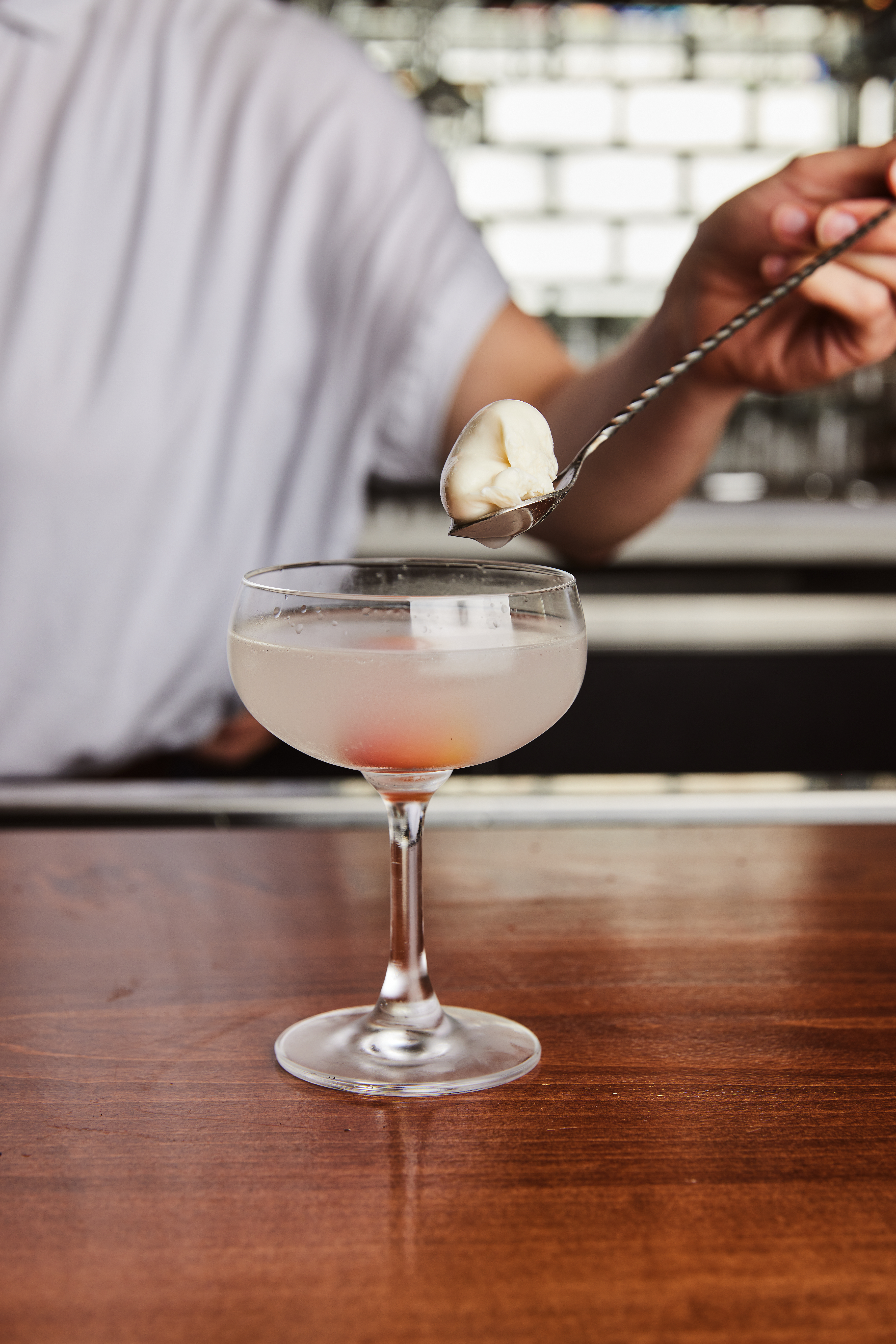 Bastone's cocktails include the Ace of Clubs, a riff on a dirty martini. Courtesy of Kathryn McCrary Photography