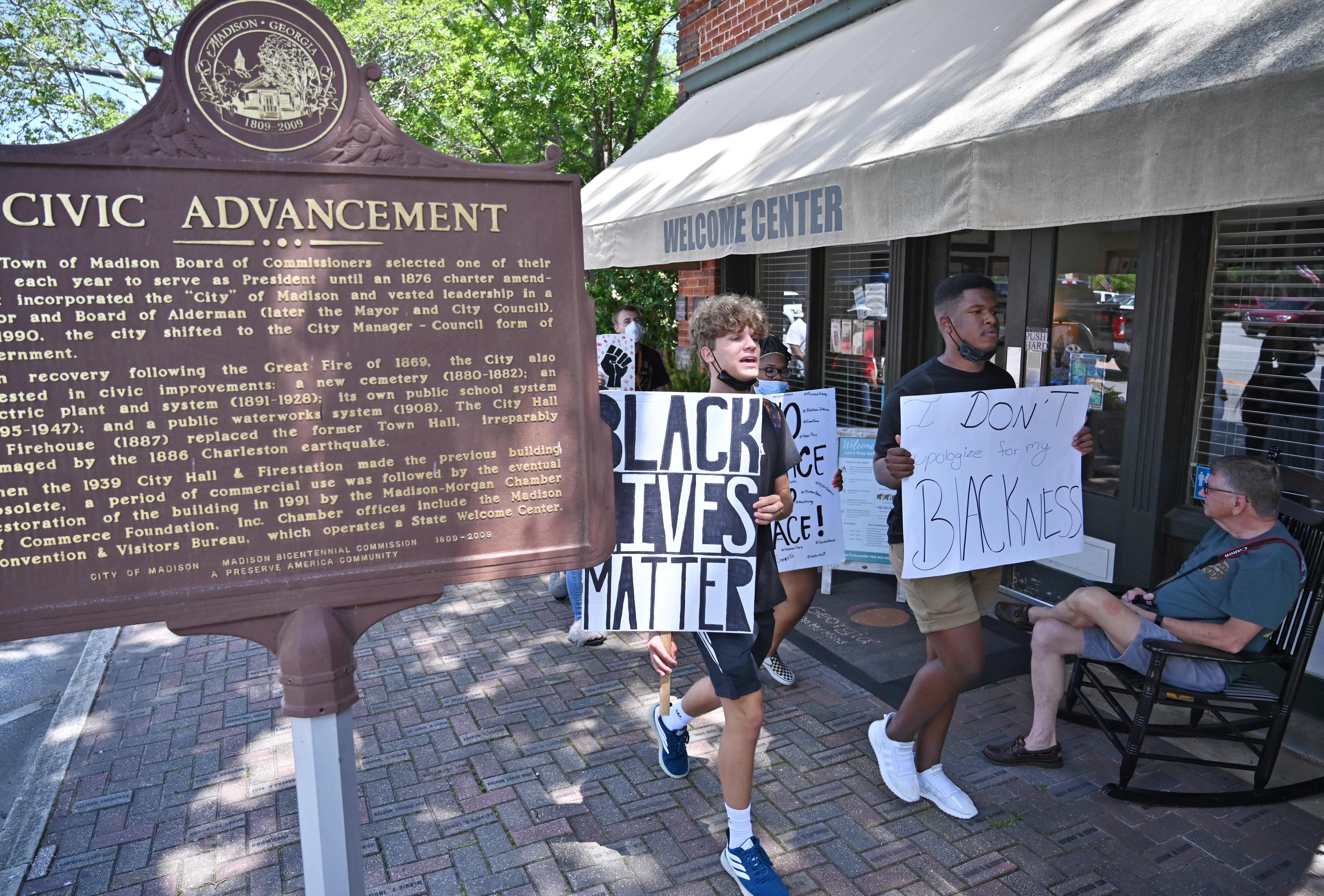 June 19, 2020 Madison - John Kirbymurdoch (left), 16 and Alex Williams (right), both 16 and students at Morgan County High School, lead a peaceful, youth-led march in downtown Madison on Friday, June 19, 2020. As protests in response to the death of George Floyd spread nationwide earlier this month, they started to pop up in some unexpected places: namely, the Atlanta exurbs, places like Cartersville, Peachtree City, Forsyth County, Braselton and Madison -- the predominantly white town about an hour east on I-20, whose main street is still lined with antebellum homes that Gen. Sherman purportedly found too beautiful to burn. (Hyosub Shin / Hyosub.Shin@ajc.com)