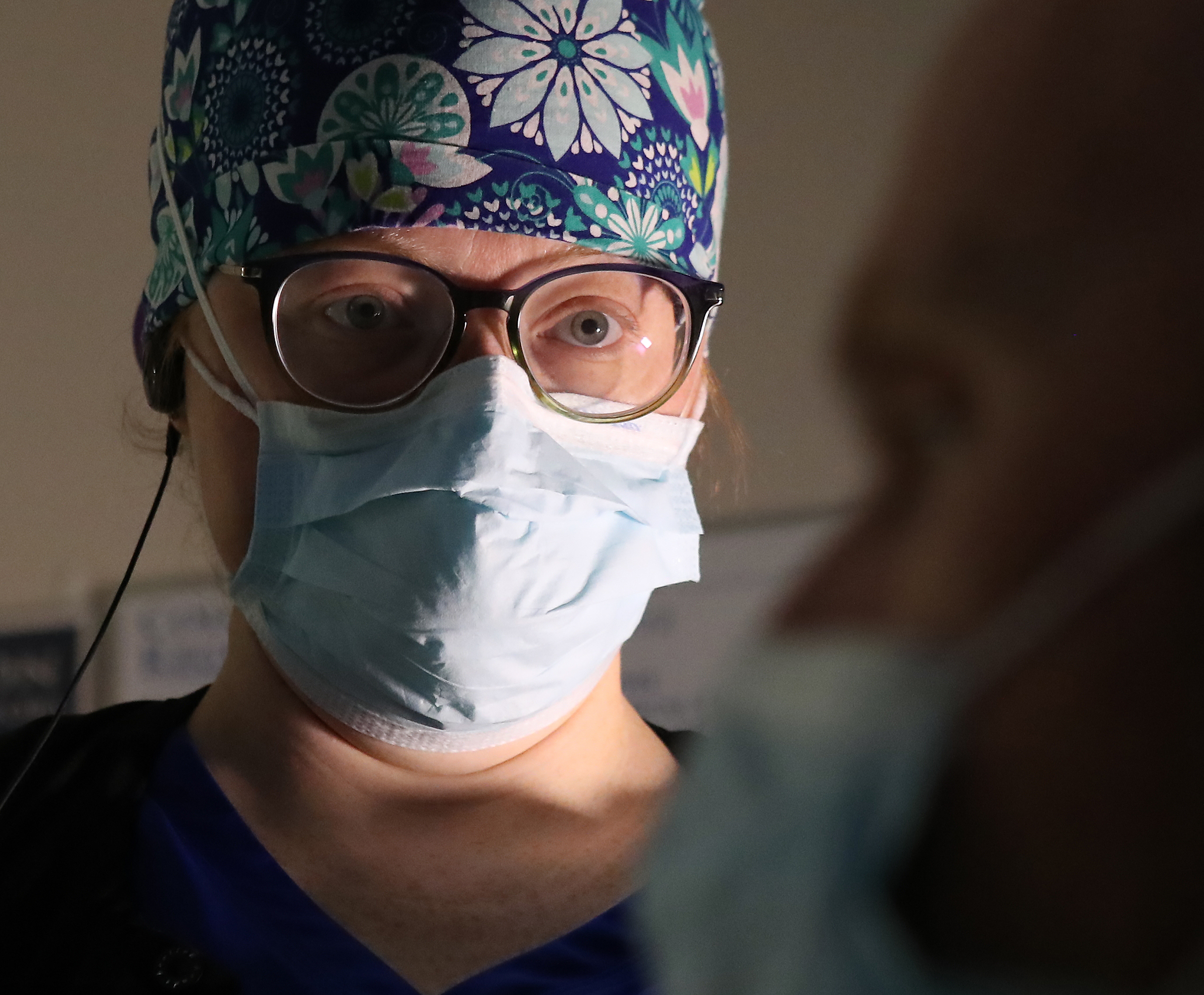 Nurse Carey Mullis, says, “I can’t blame the people who have left, and I can’t even say that I haven’t considered leaving many times lately. We’re giving all we have to these people, and sometimes they’re just not making it. Lately it’s been 20- and 30-year-olds, not just the elderly people ... it’s just been so much, back to back to back.” (Curtis Compton / Curtis.Compton@ajc.com)