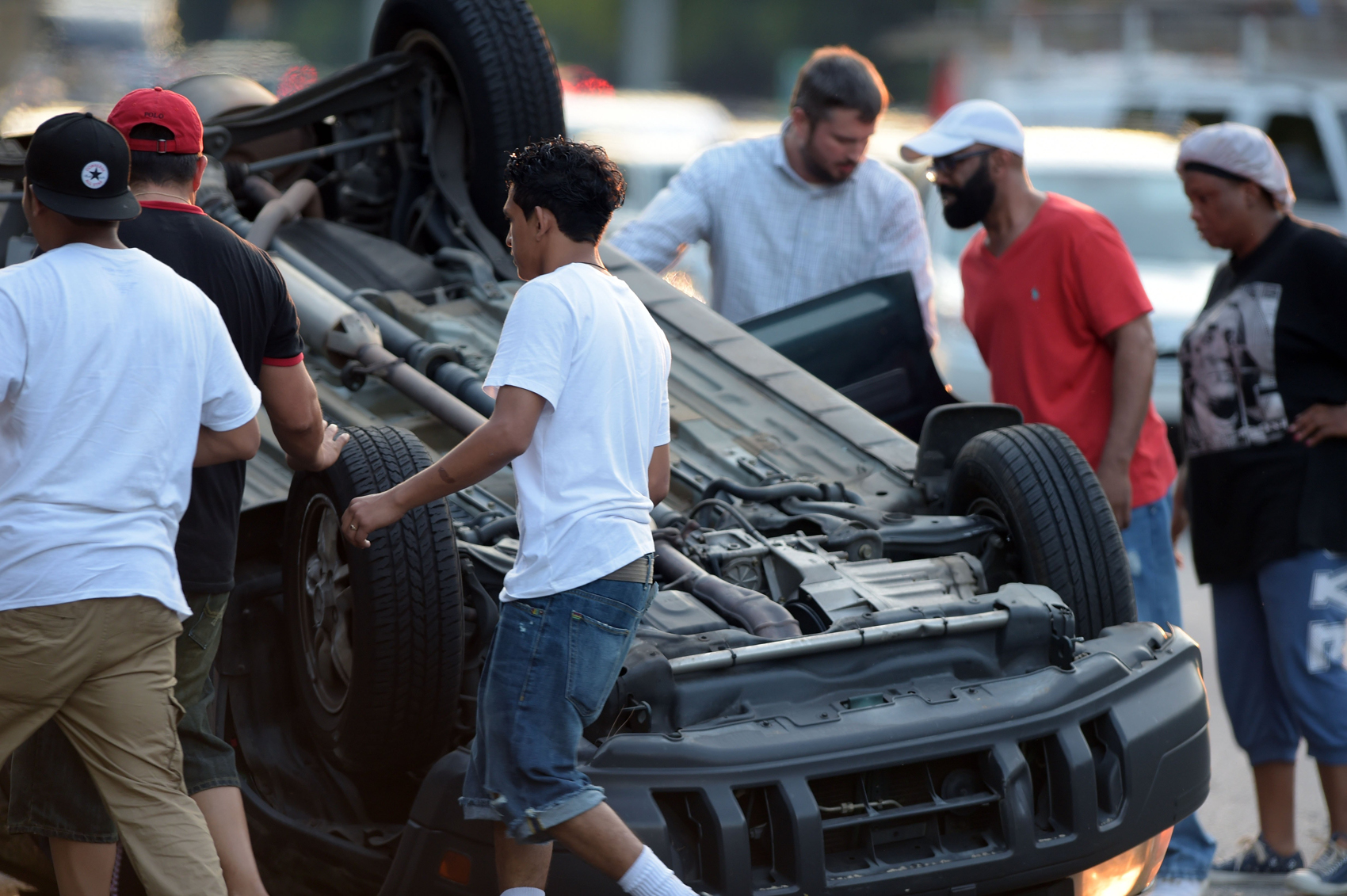 Dunwoody police and DeKalb Fire Rescue respond to a vehicle wreck with an overturned SUV that closed several lanes of I-285 shortly after 8 p.m. in this AJC file photo taken August 3, 2016. (KENT D. JOHNSON/ AJC.com)