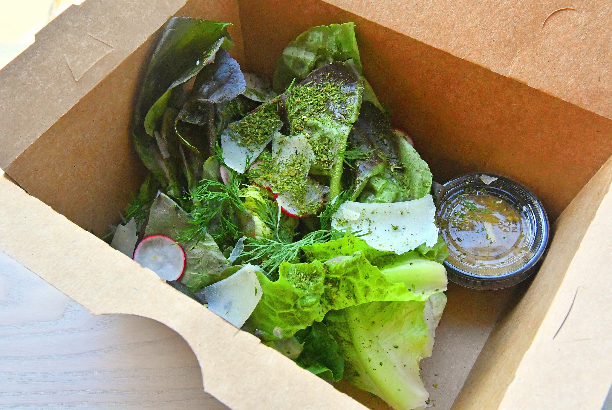 Gem lettuce al pil pil salad tossed with Basque style emulsified aromatic olive oil sauce, topped with Idiazabal cheese, 'Tammy the sourdough' gremolata and tons of dill. CONTRIBUTED BY CHRIS HUNT PHOTOGRAPHY)