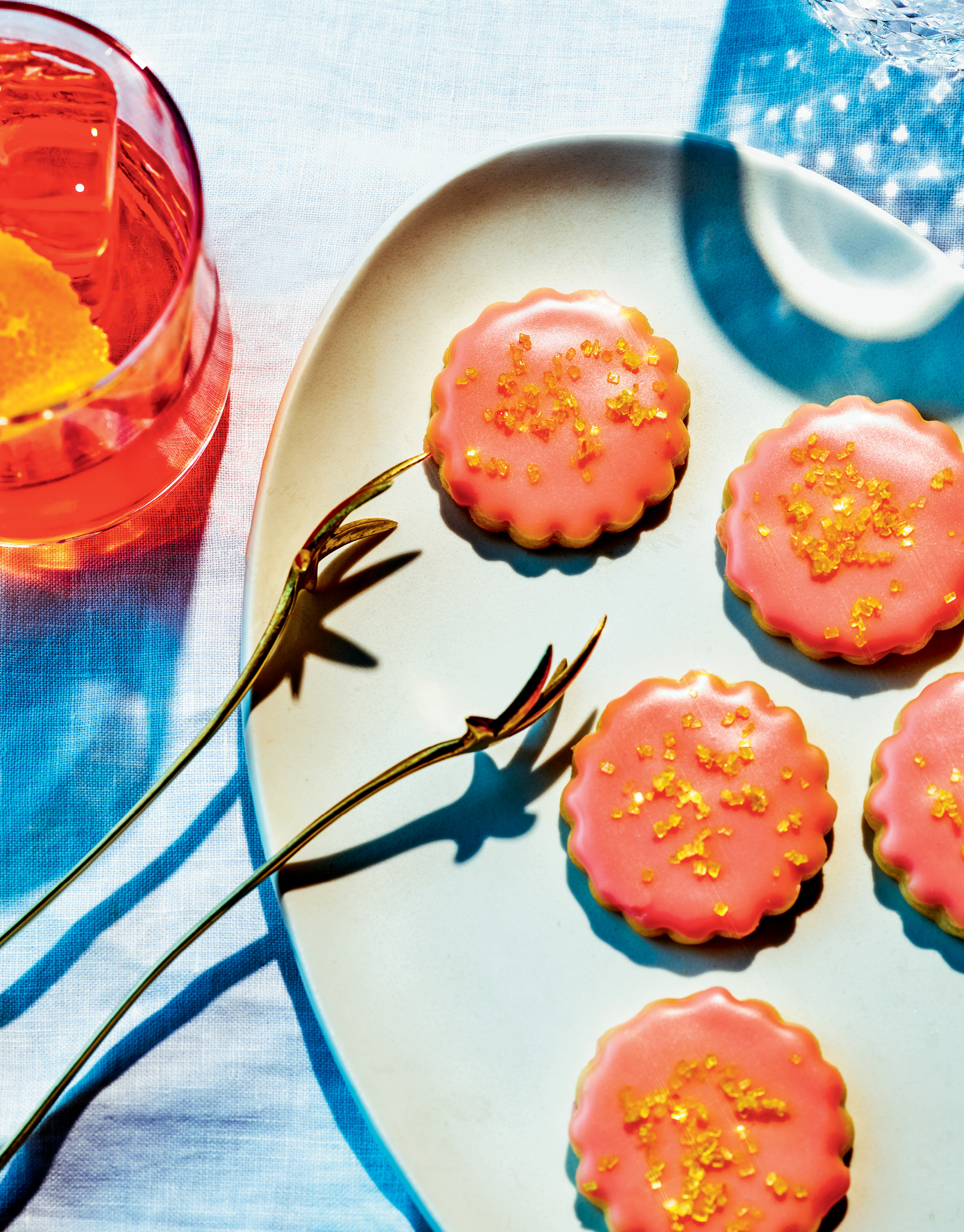 Jesse Szewczyk shows how to dress up a basic butter cookie for a night on the town with just a few well-chosen ingredients in Campari Shortbread Cookies with Crunchy Orange Sugar. From “Cookies: The New Classics” by Jesse Szewczyk (Potter, $27.50). (Courtesy of Chelsea Kyle)