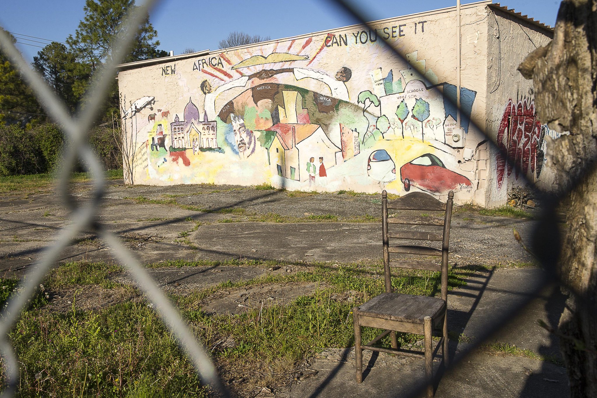 An abandoned building sits gated in the Peoplestown community.