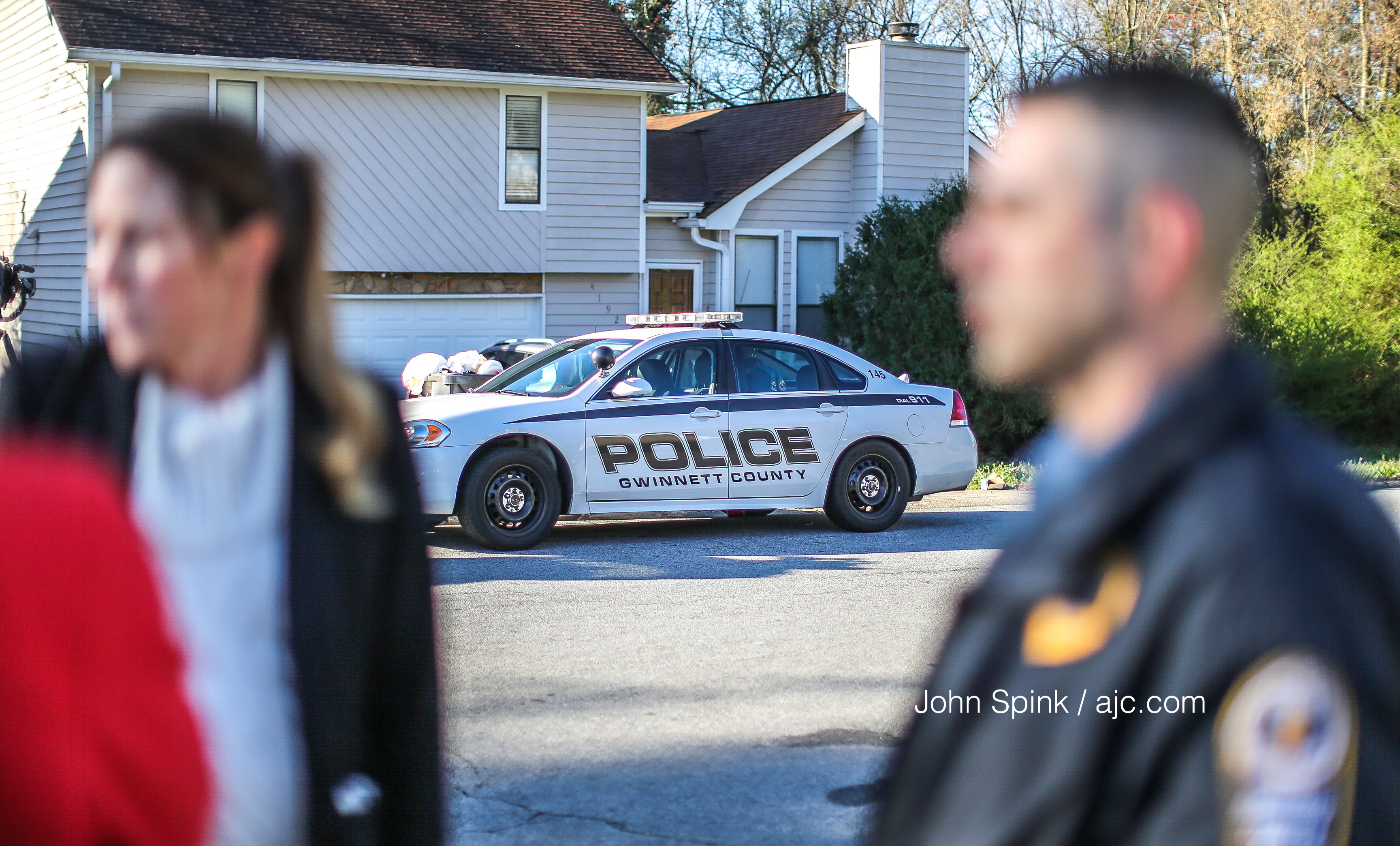 Gwinnett County police investigated a woman's death on Phil Niekro Parkway. JOHN SPINK / JSPINK@AJC.COM