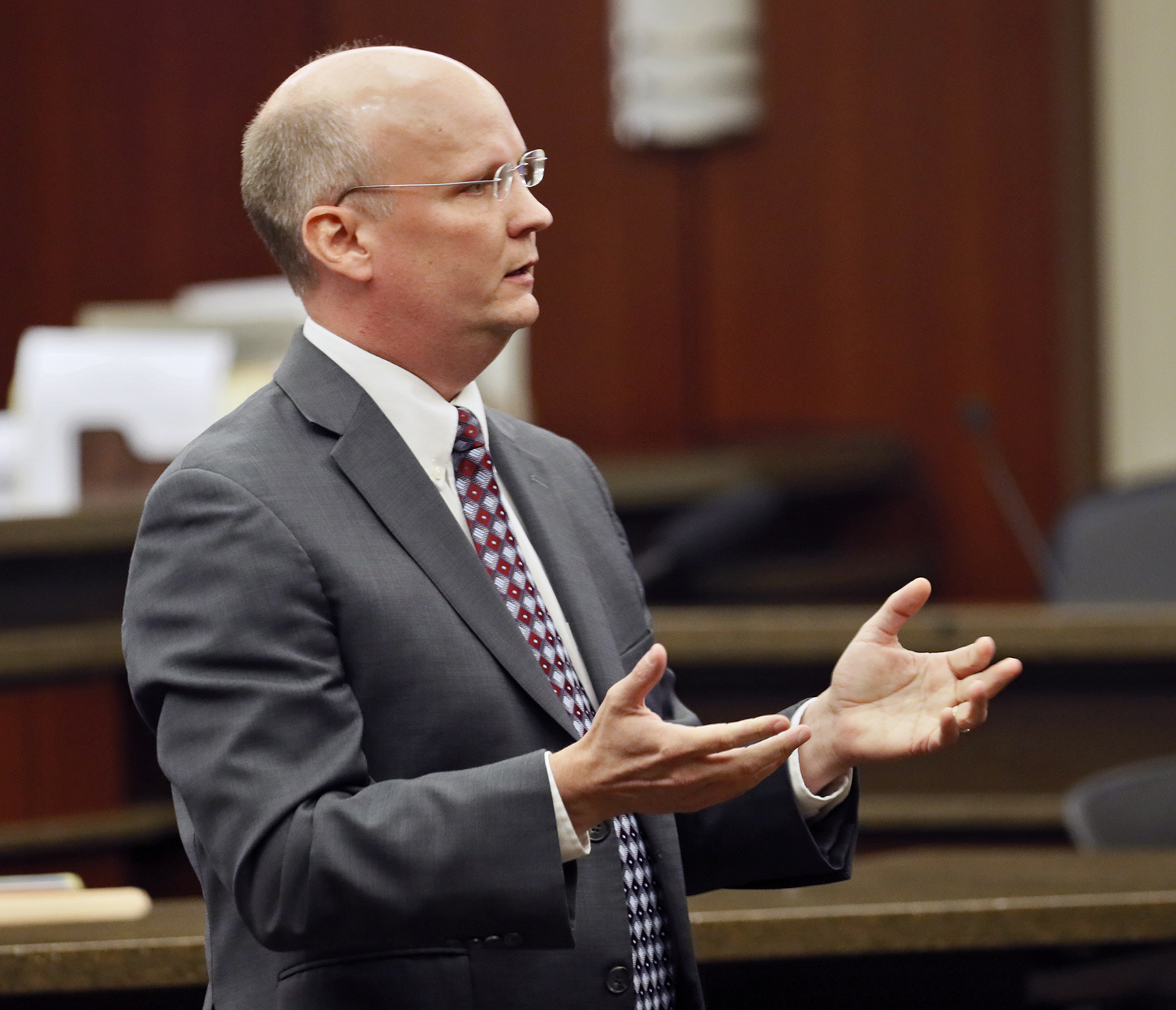 Cobb prosecutor Jason Marbutt delivering his opening statement in the recent trial of a caregiver charged with elder abuse and neglect. It is rare, he says, for his office to see reports of elder abuse and neglect in senior care facilities. “I don’t believe it’s because they don’t exist,” he said. “I think it’s because we don’t know about them.” (Bob Andres / bandres@ajc.com)