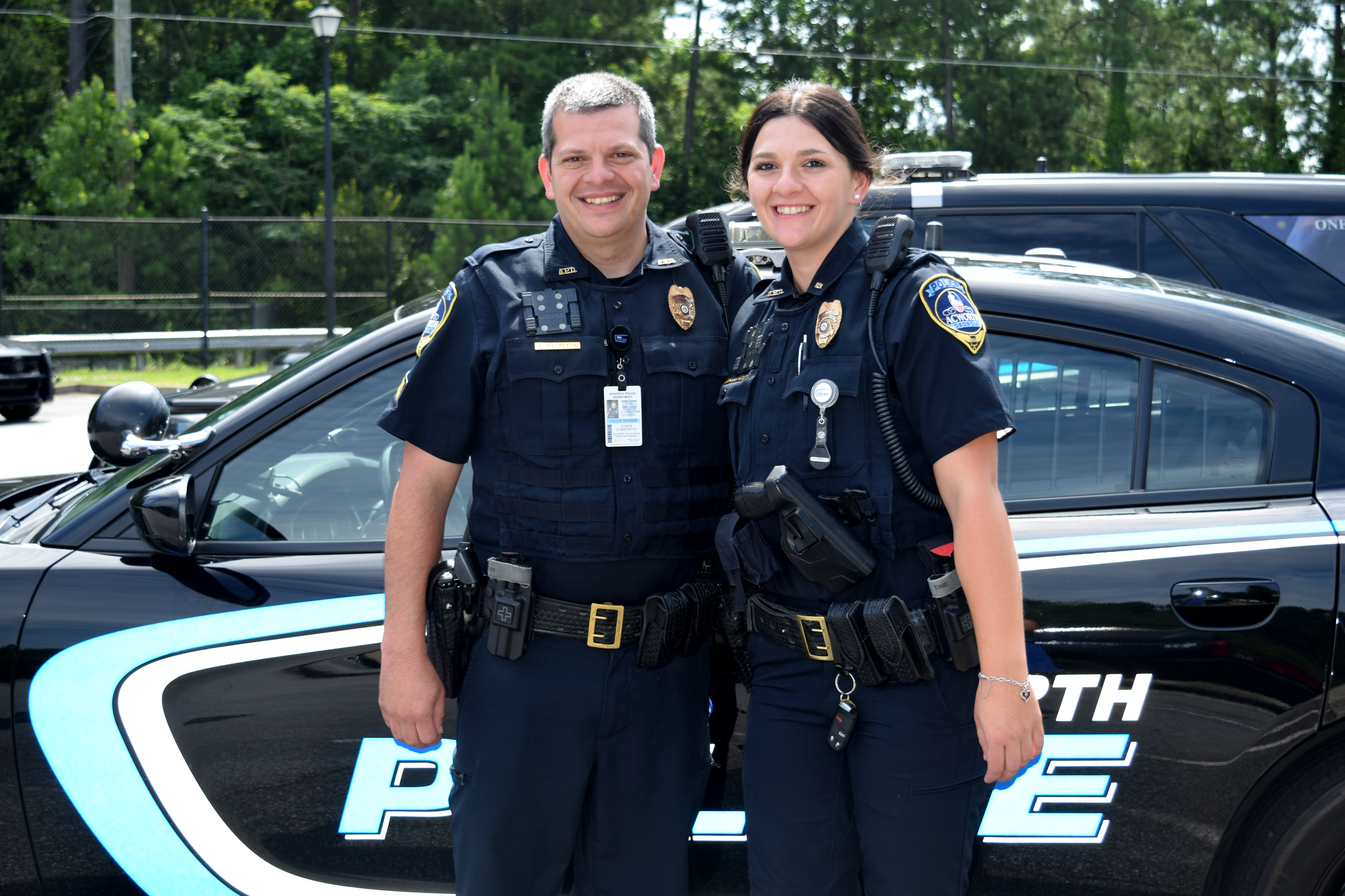 Family in blue Brother sister duo wear the badges for Acworth police