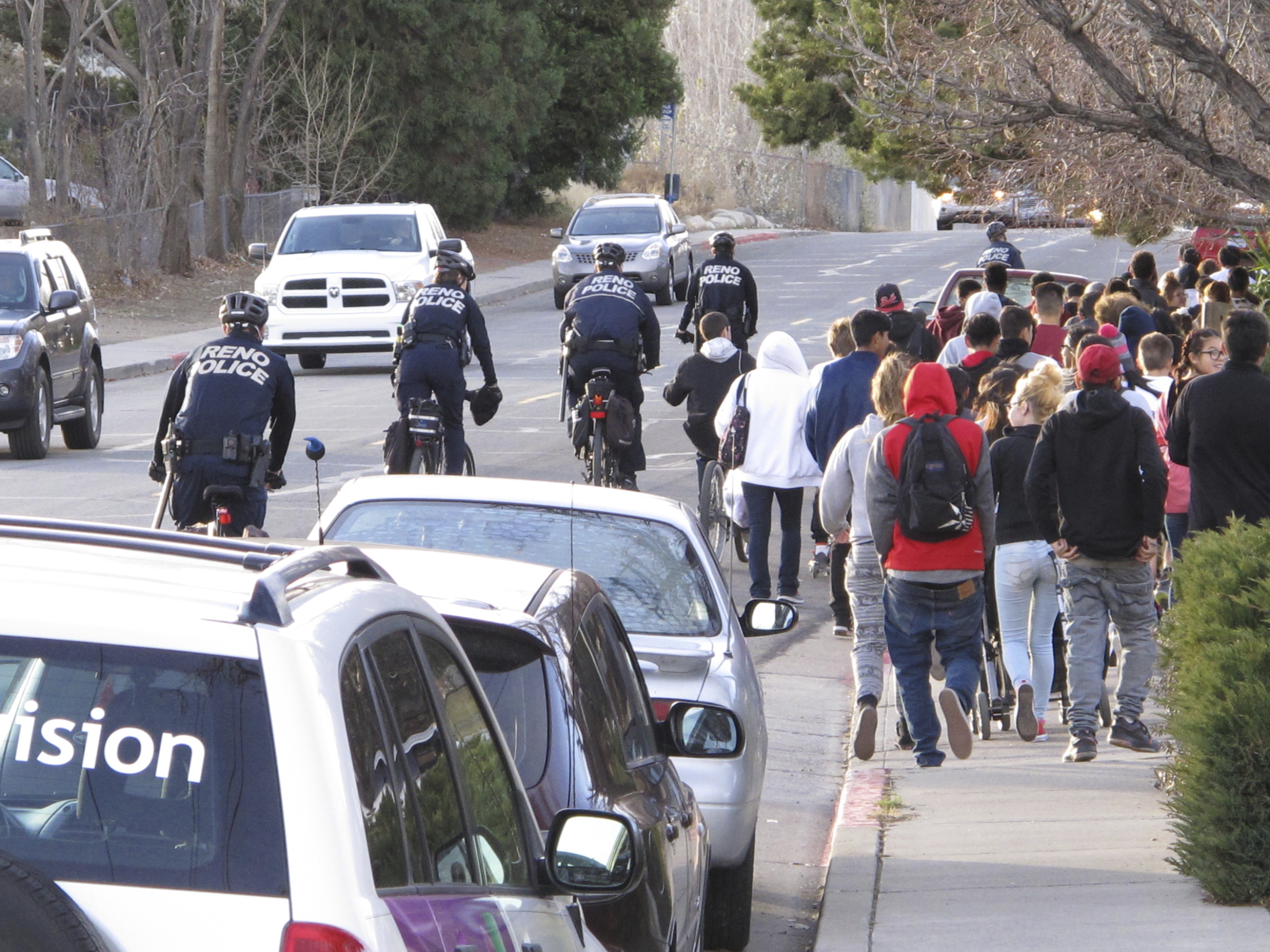 Police: 14-year-old boy shot by school officer attacked...