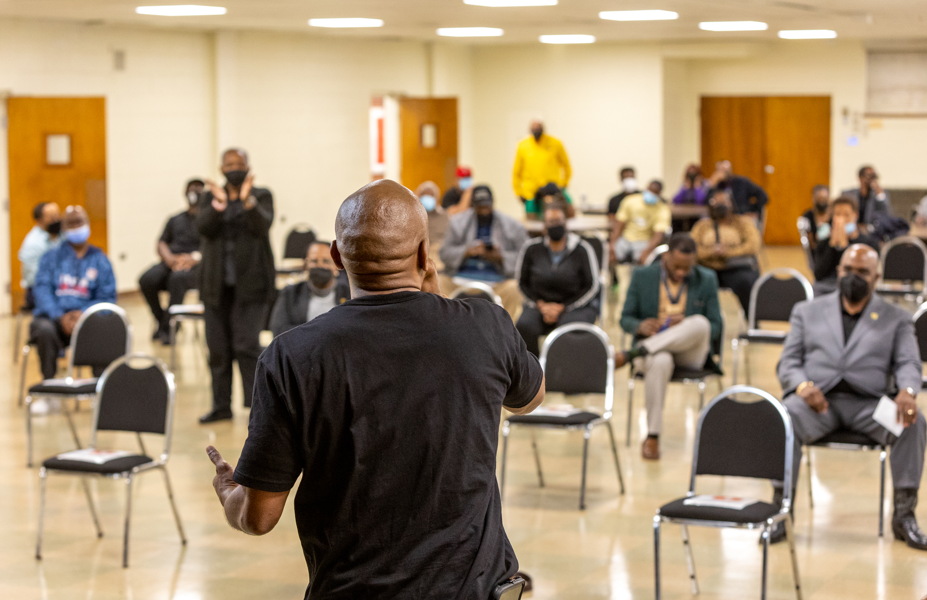Kenneth Miller, a Fulton County high school athletic director, speaks at a rally for him at East Point First Mallalieu United Methodist Church on March 17, 2022. Miller is appealing a suspension after he was accused of pushing a student during a campus search for a handgun. He has been on paid leave from his post at Tri-Cities High School since shortly after the August incident. (Jenni Girtman for The Atlanta Journal-Constitution)