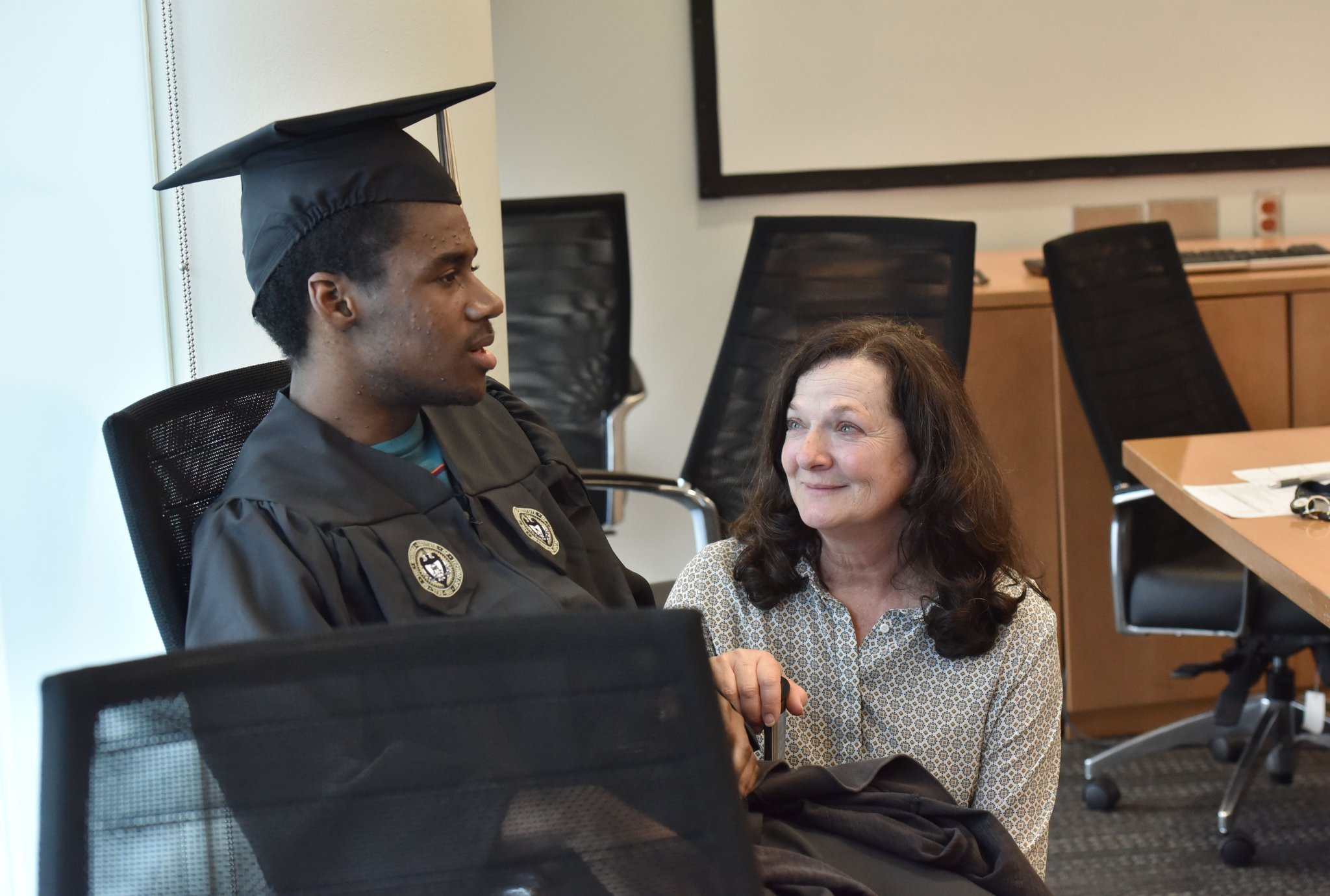 Rene Reese, right, career development coordinator, talks to Rashad Isaac, a student in the EXCEL program for students with intellectual disabilities at Georgia Tech’s Scheller College of Business.