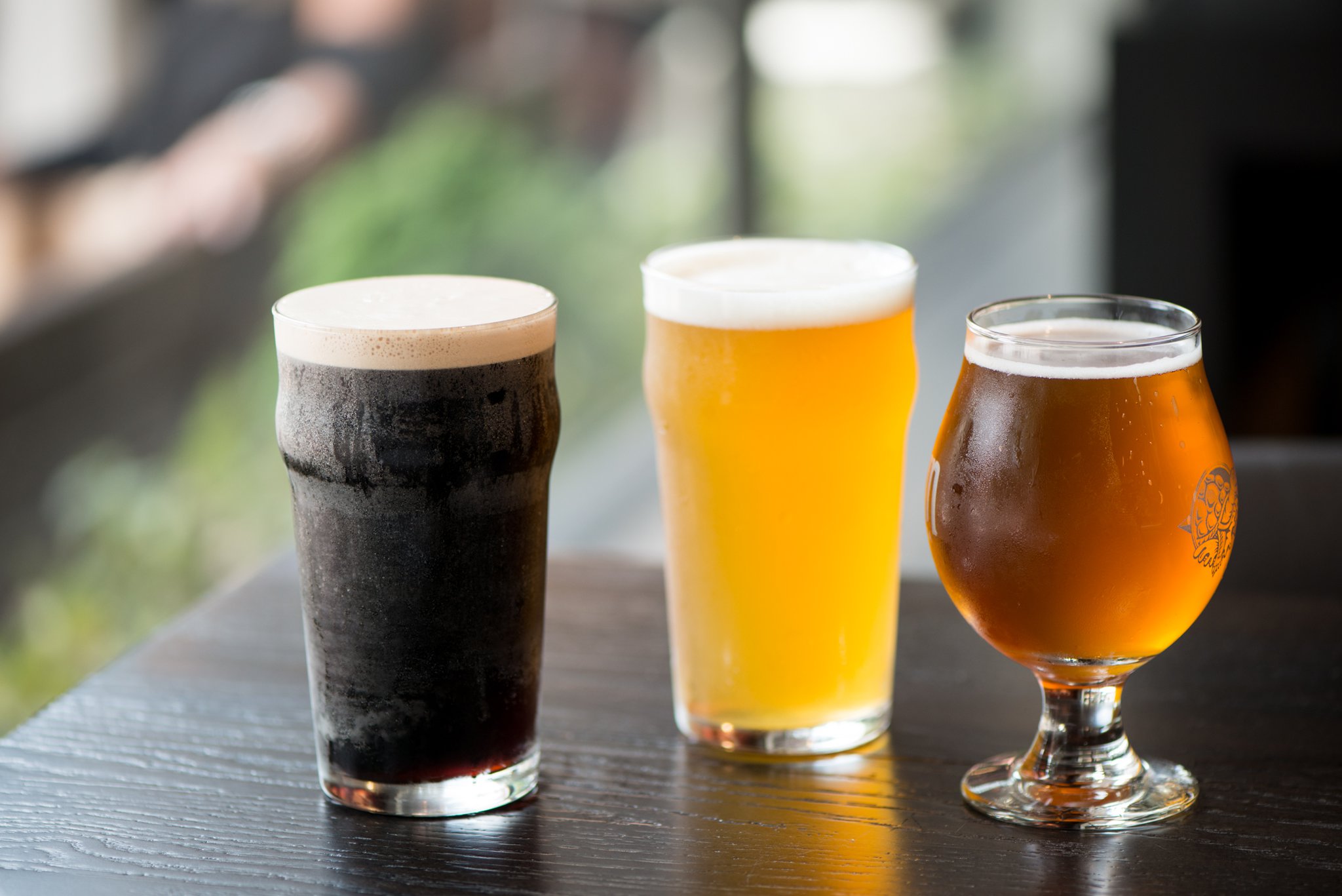 Loyal Tavern’s current beers on tap include (from left) Guinness Stout, Creature Comforts Tropicalia IPA, and Scofflaw Goats Milk IPA. Photo credit- Mia Yakel.