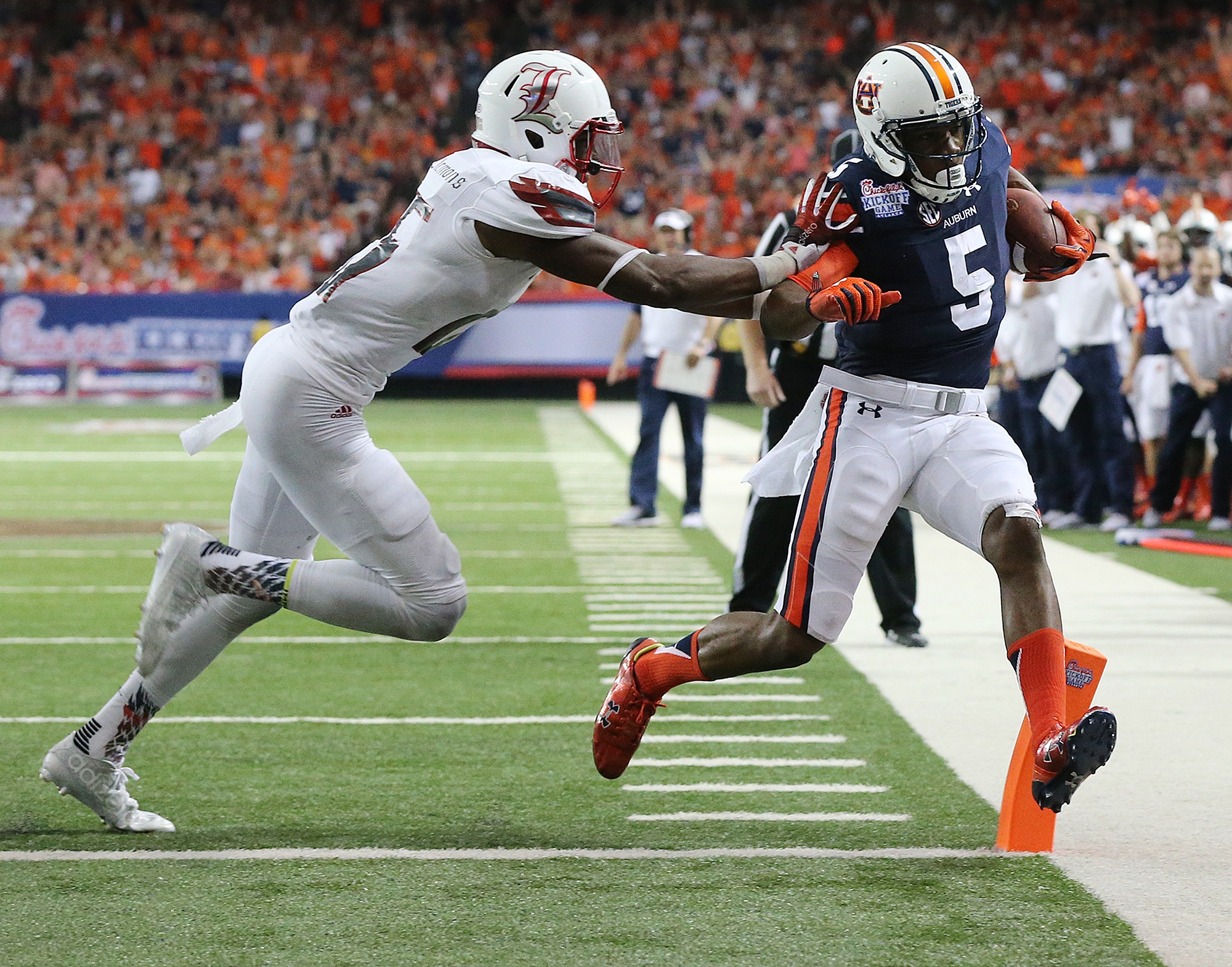 Auburn's Chris Davis and Ricardo Louis will forever be linked to