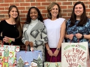 Senior group delivers Christmas gift bags to Hutchinson nursing home