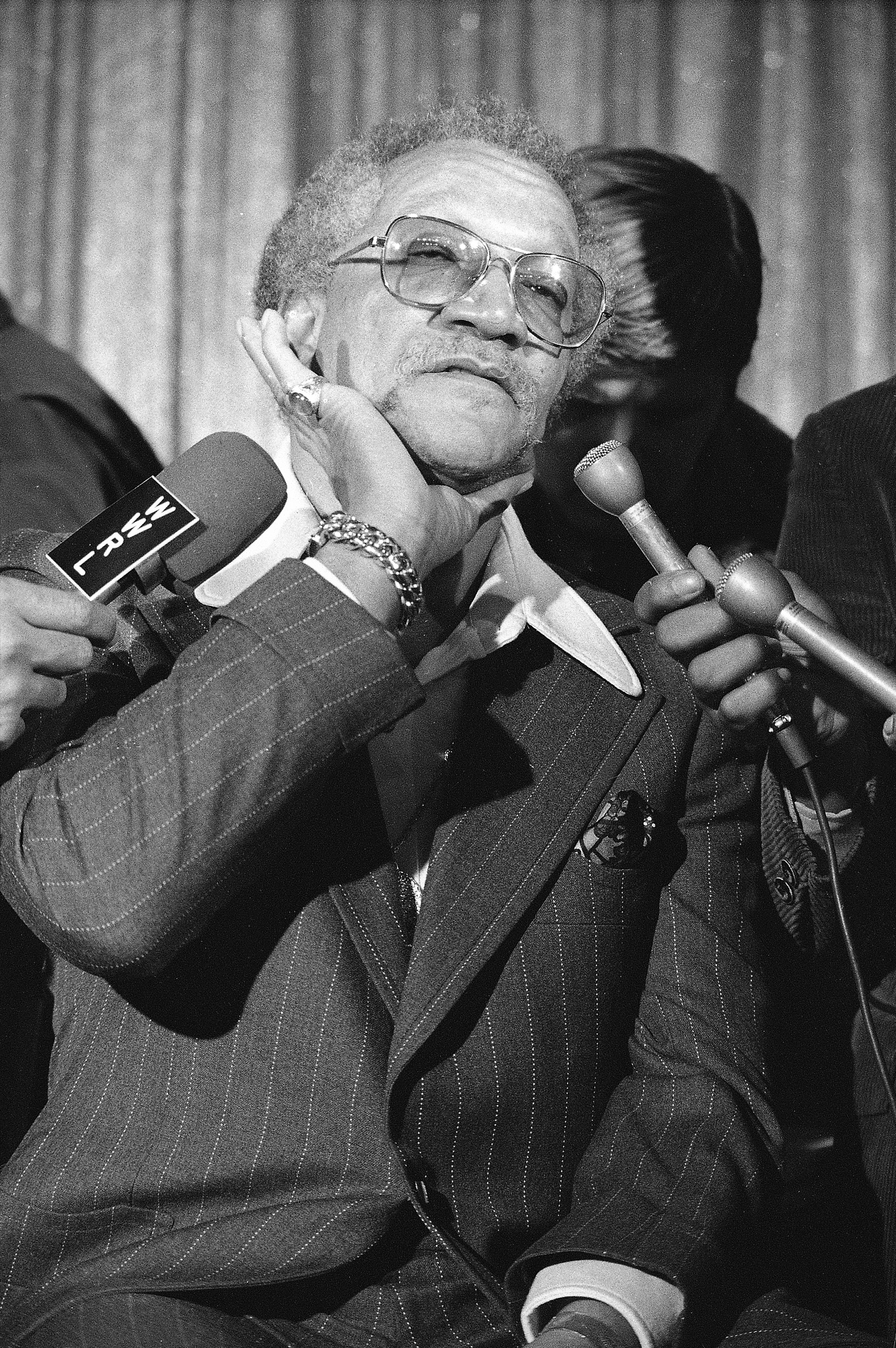 Comedian Redd Foxx rests his head in his hand, complaining of back pain as he tells newsmen reasons he left the top-rated sitcom "Sanford & Son," March 14, 1974 in New York. Foxx said he'd return to the series if NBC corrects certain conditions, including the show's depiction of African American life. (AP Photo/Marty Lederhandler)