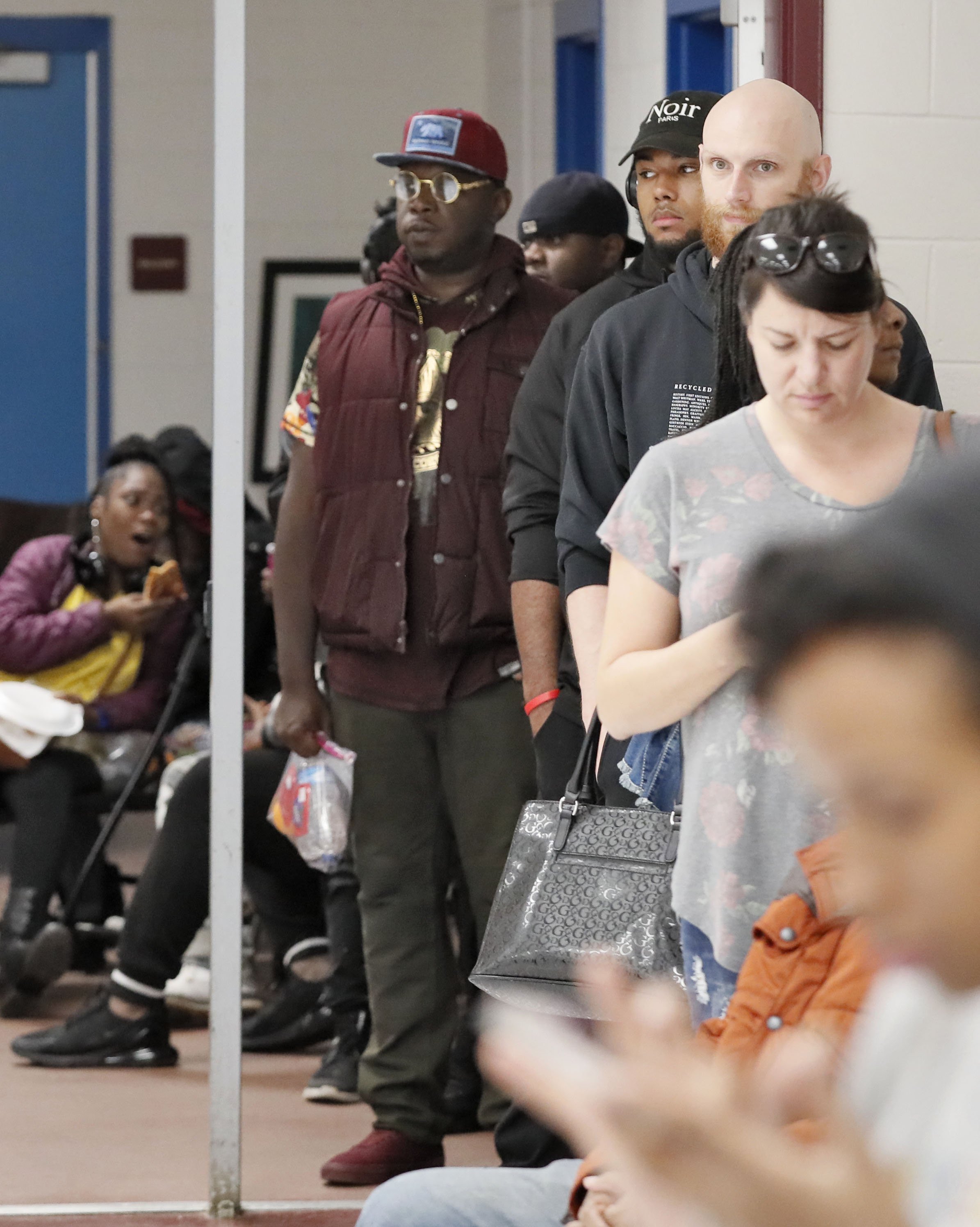 11/6/18 - Atlanta - The wait time to vote at the Pittman Park precinct in Atlanta was reported to be three hours. Pizza and snacks were donated for the people waiting in line. BOB ANDRES / BANDRES@AJC.COM