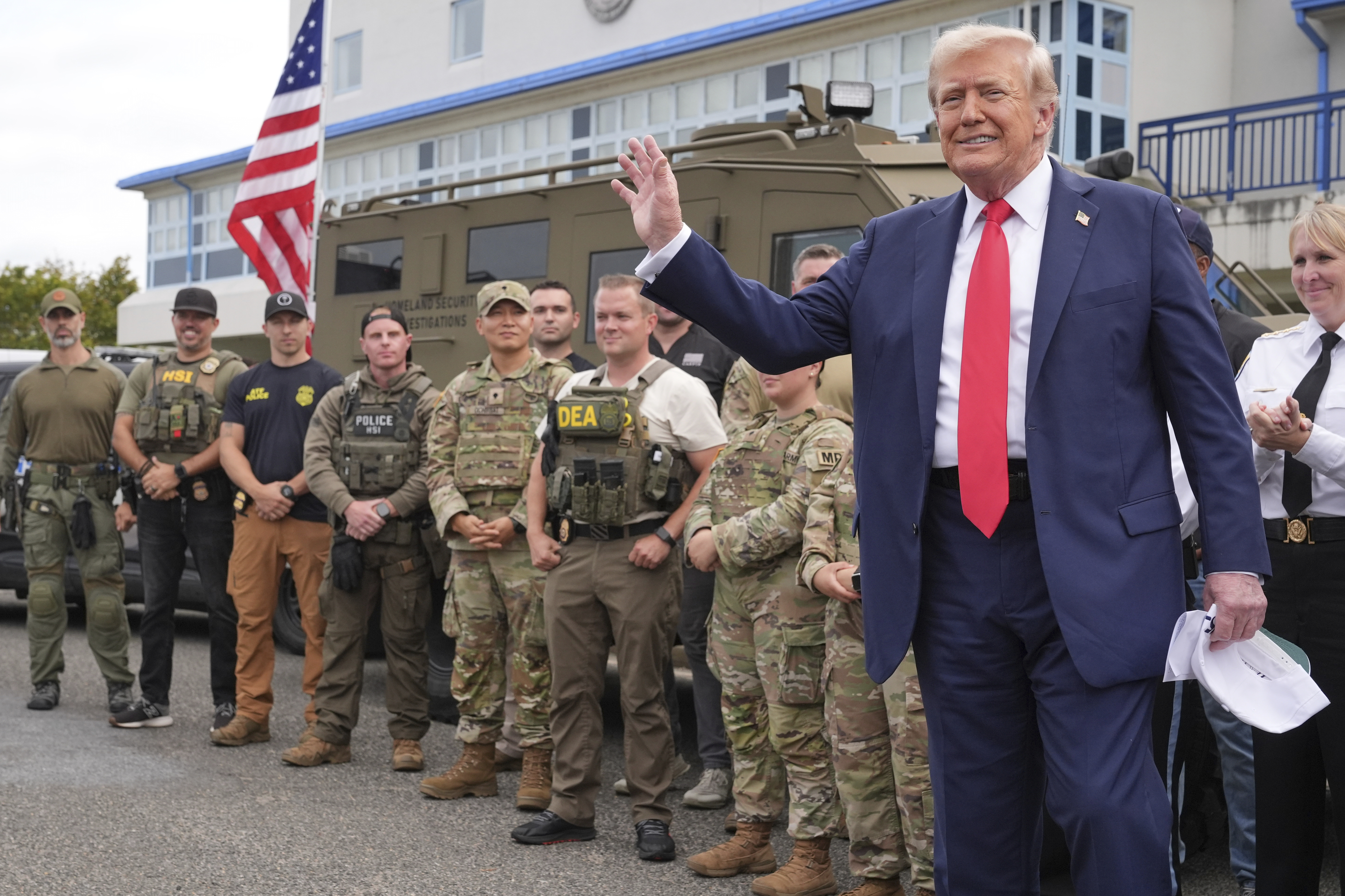 Trump touts tough-on-crime mantra during visit to Guard troops in DC