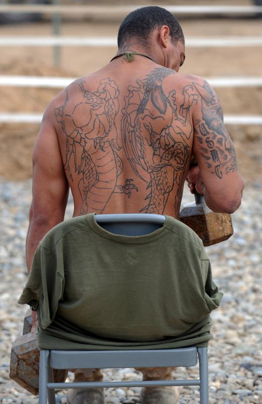 Marines Alter Women's Uniform Policy to Cover Tattoos - WSJ