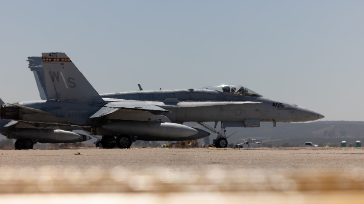 In close call with Marine F/A-18, private jet took 'evasive action'