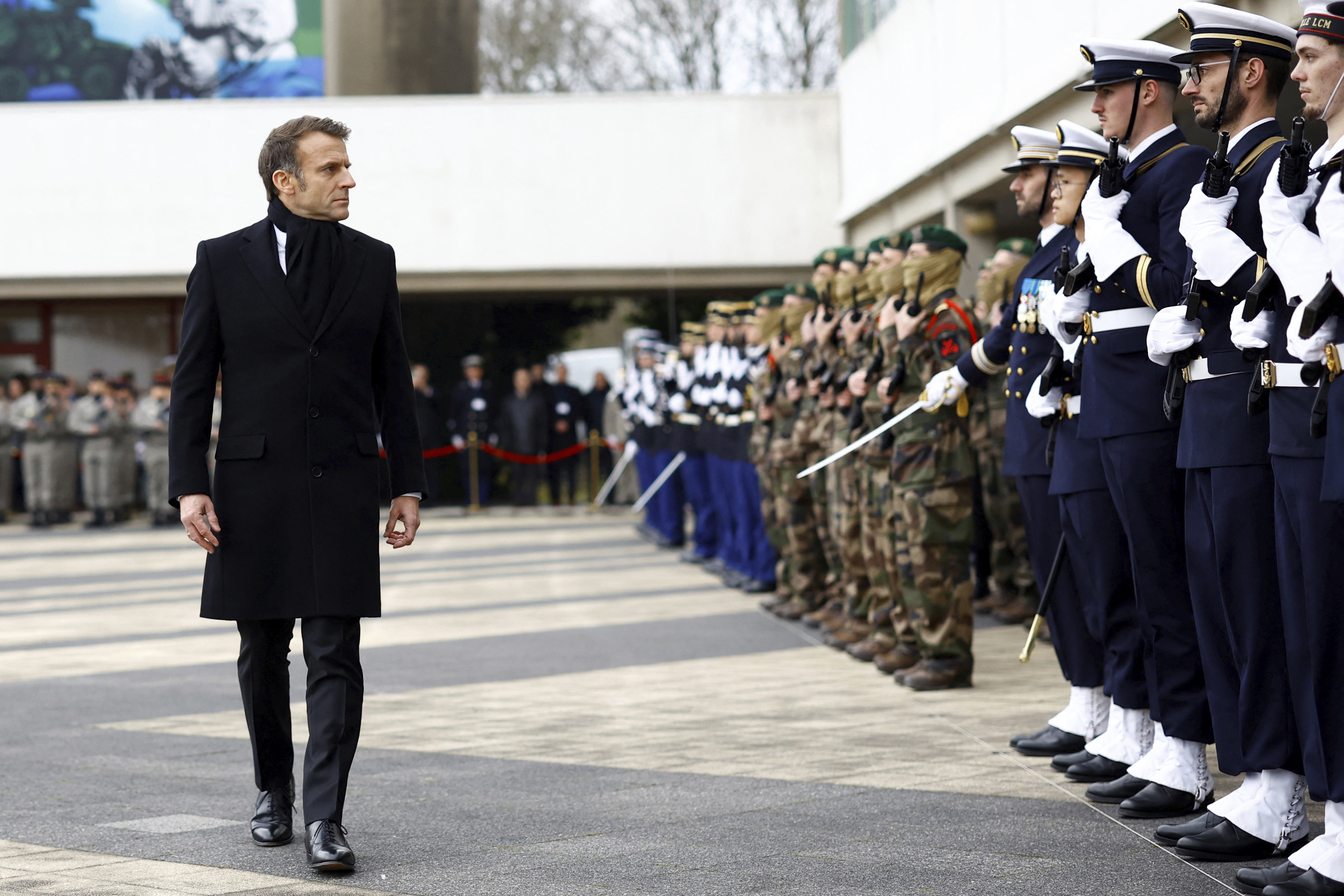 Wake up about defense, Macron tells Europe as Trump takes office