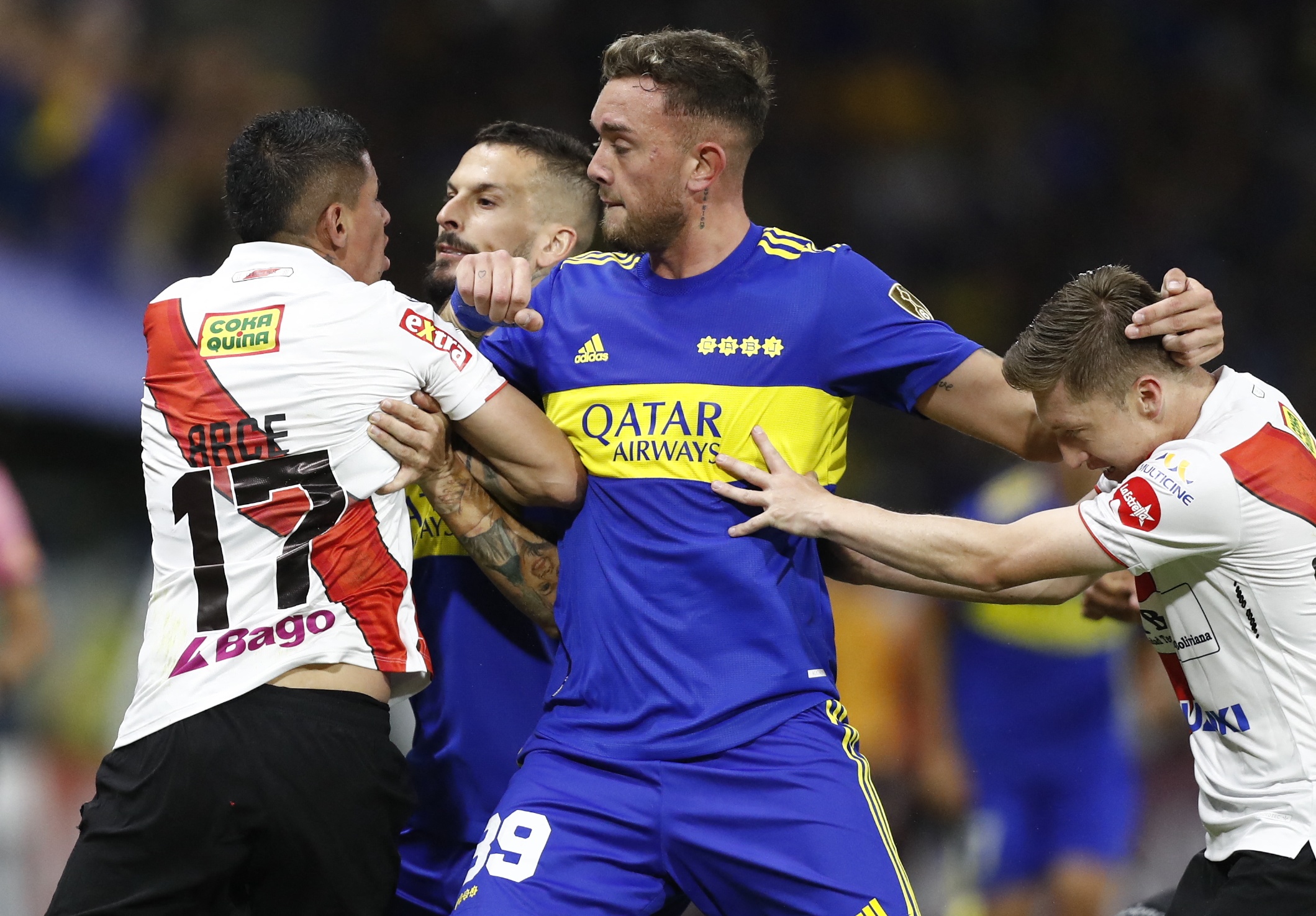 Soccer Football - Copa Libertadores - Group  E - Boca Juniors v Always Ready - Estadio La Bombonera, Buenos Aires, Argentina - April 12, 2022. Boca Juniors' Dario Benedetto clashes with Always Ready's Juan Arce REUTERS/Agustin Marcarian