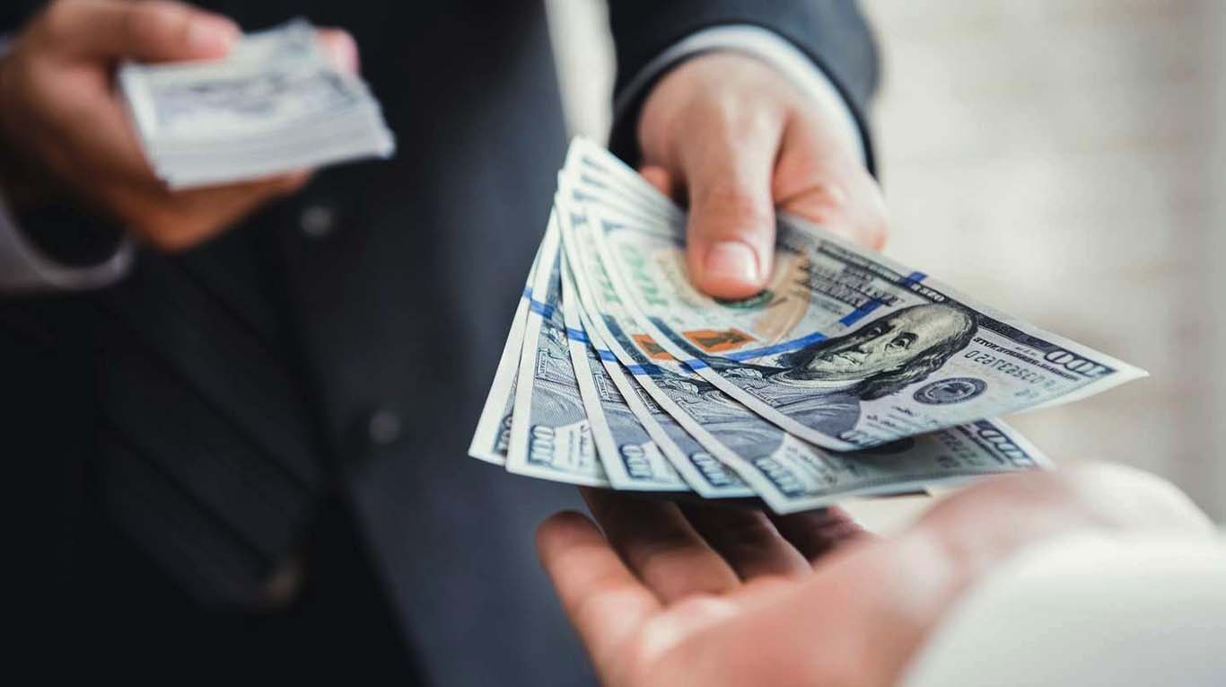 El contado con liquidación es el tipo de cambio que se obtiene al comprar un bono en pesos, venderlo en dólares y girar esas divisas al exterior. (Foto: Adobe Stock).