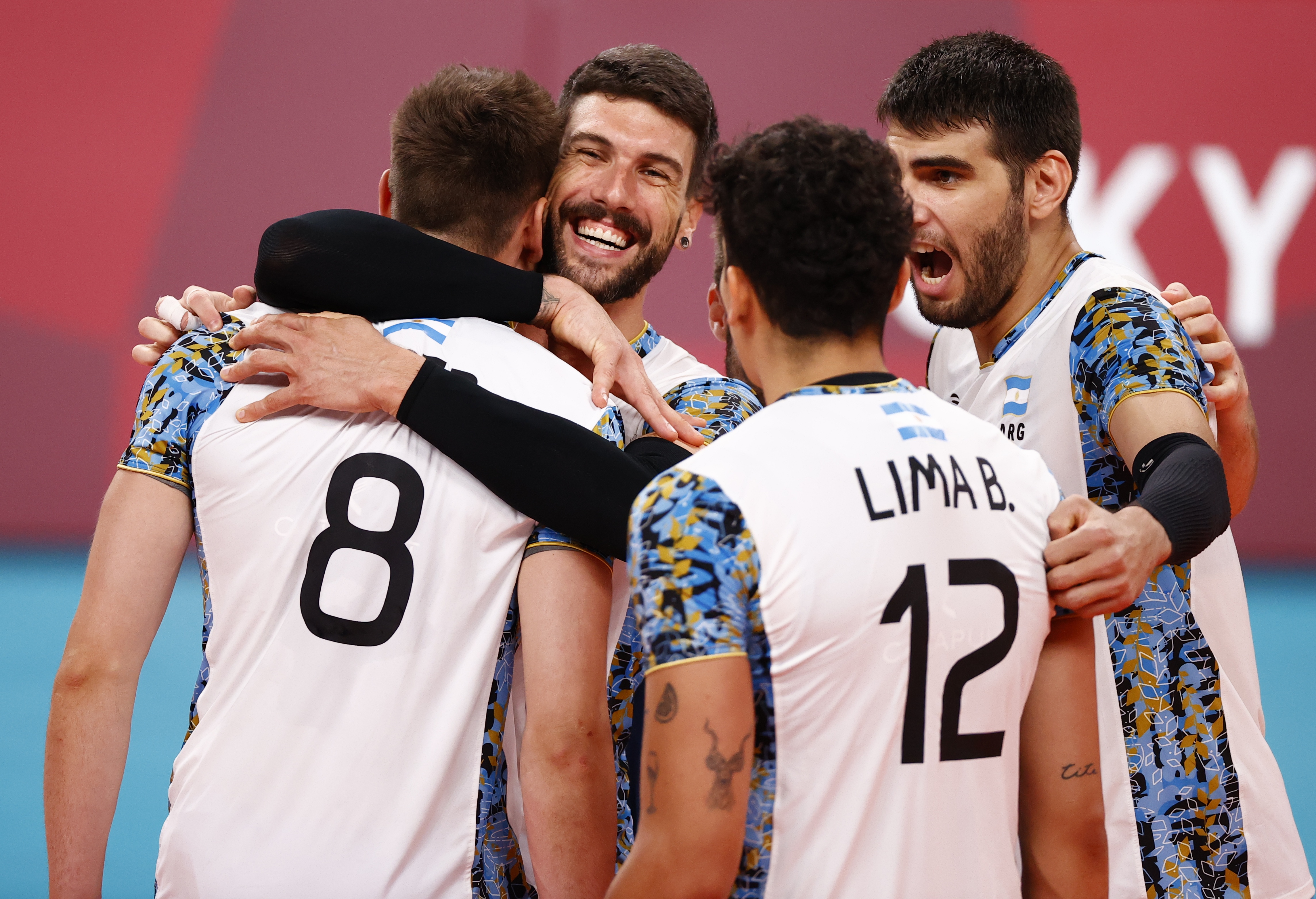 Tokyo 2020 Olympics - Volleyball - Men's Bronze medal match - Argentina v Brazil - Ariake Arena, Tokyo, Japan – August 7, 2021. Facundo Conte of Argentina celebrates with teammates. REUTERS/Carlos Garcia Rawlins