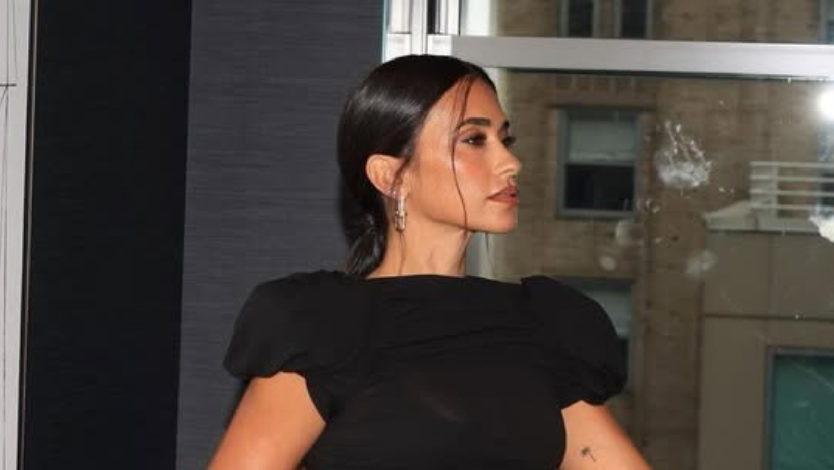 antonella roccuzzo black dress Lionel Messi's wife Antonela looks sensational in revealing black dress and  knee-high boots at Paris Fashion Week