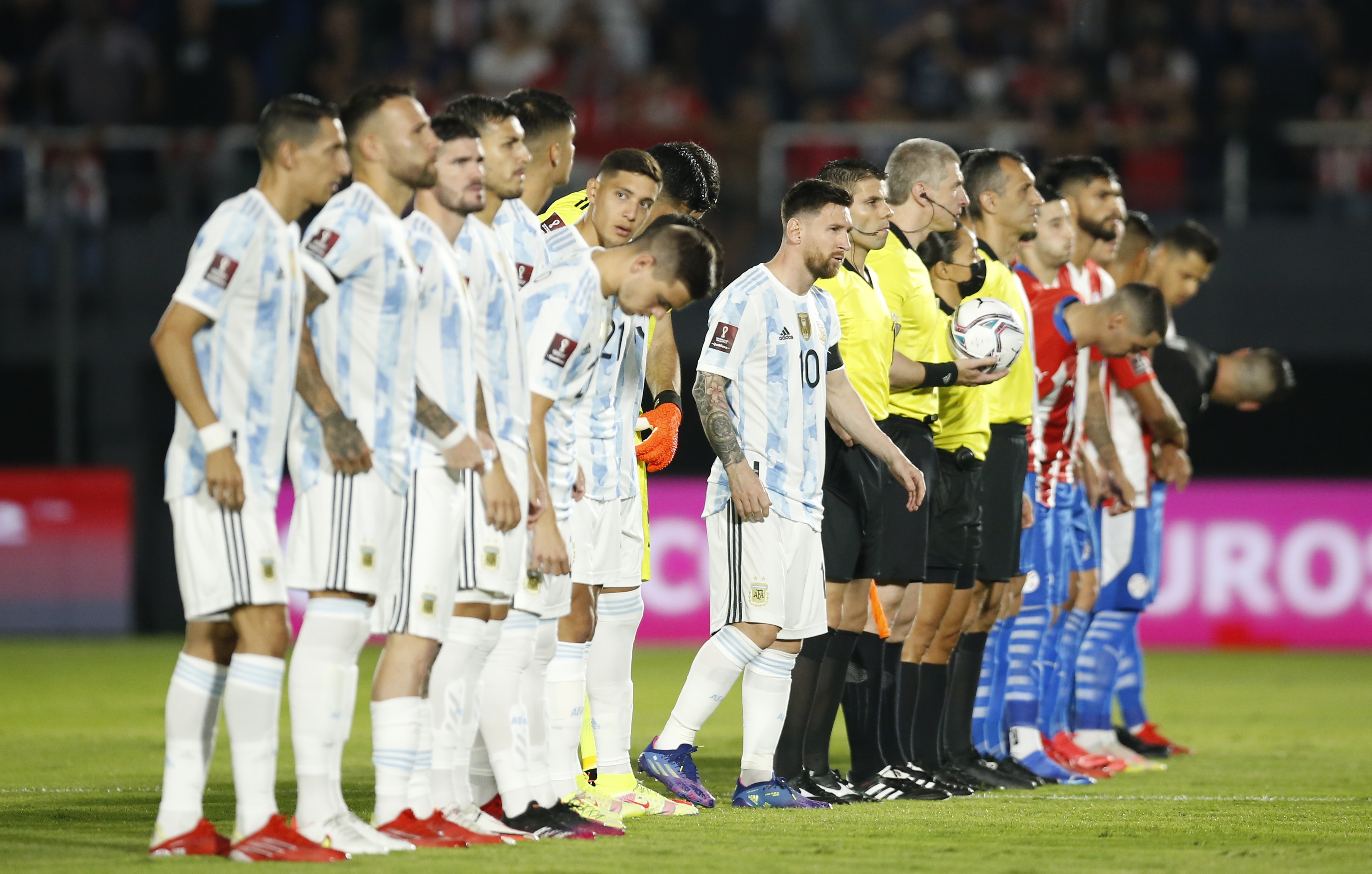 Soccer Football - World Cup - South American Qualifiers - Paraguay v Argentina - Defensores del Chaco, Asuncion, Paraguay - October 7, 2021 Players and referees lineup before the match REUTERS/Cesar Olmedo