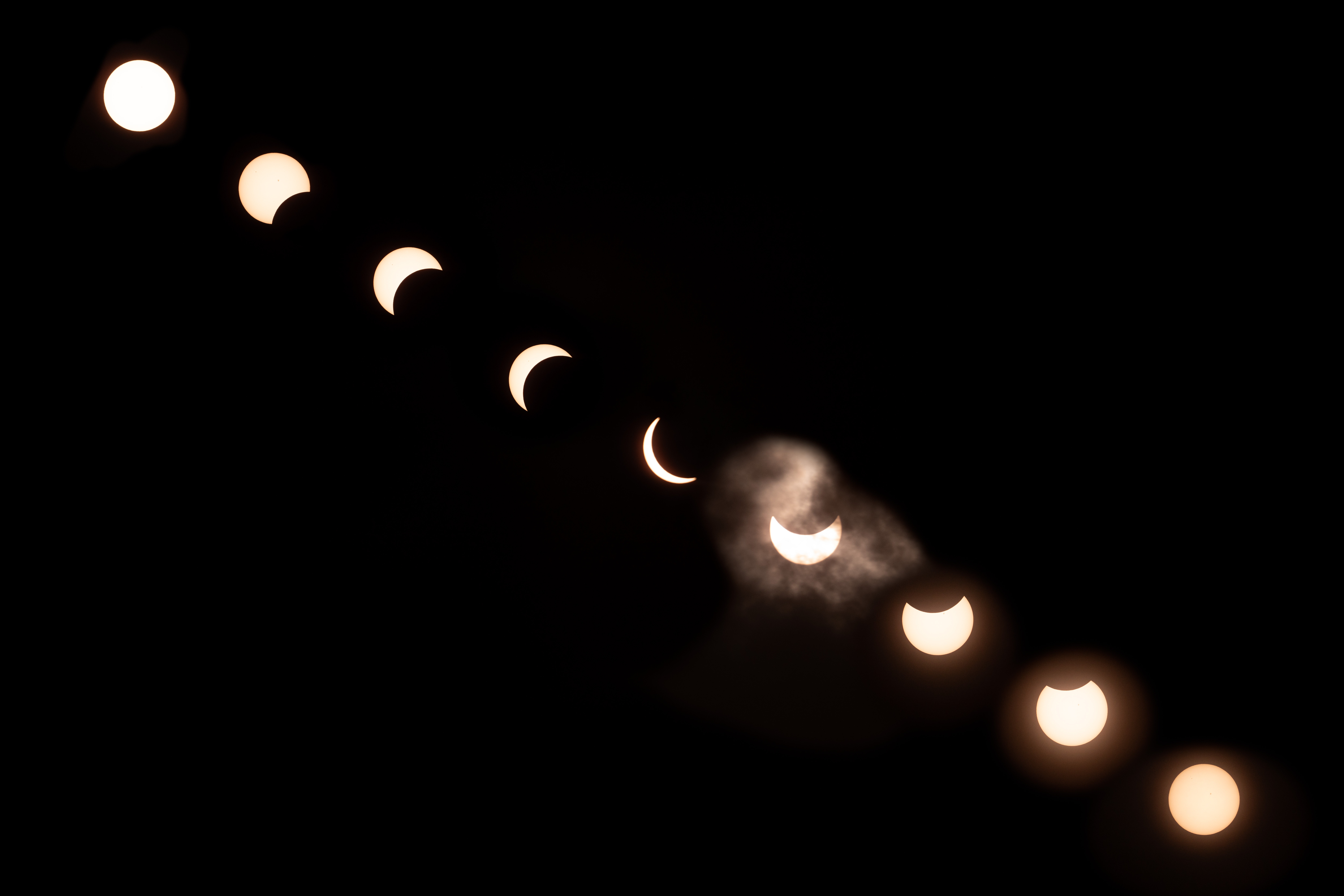 Skies darken as Marylanders look up for partial solar eclipse