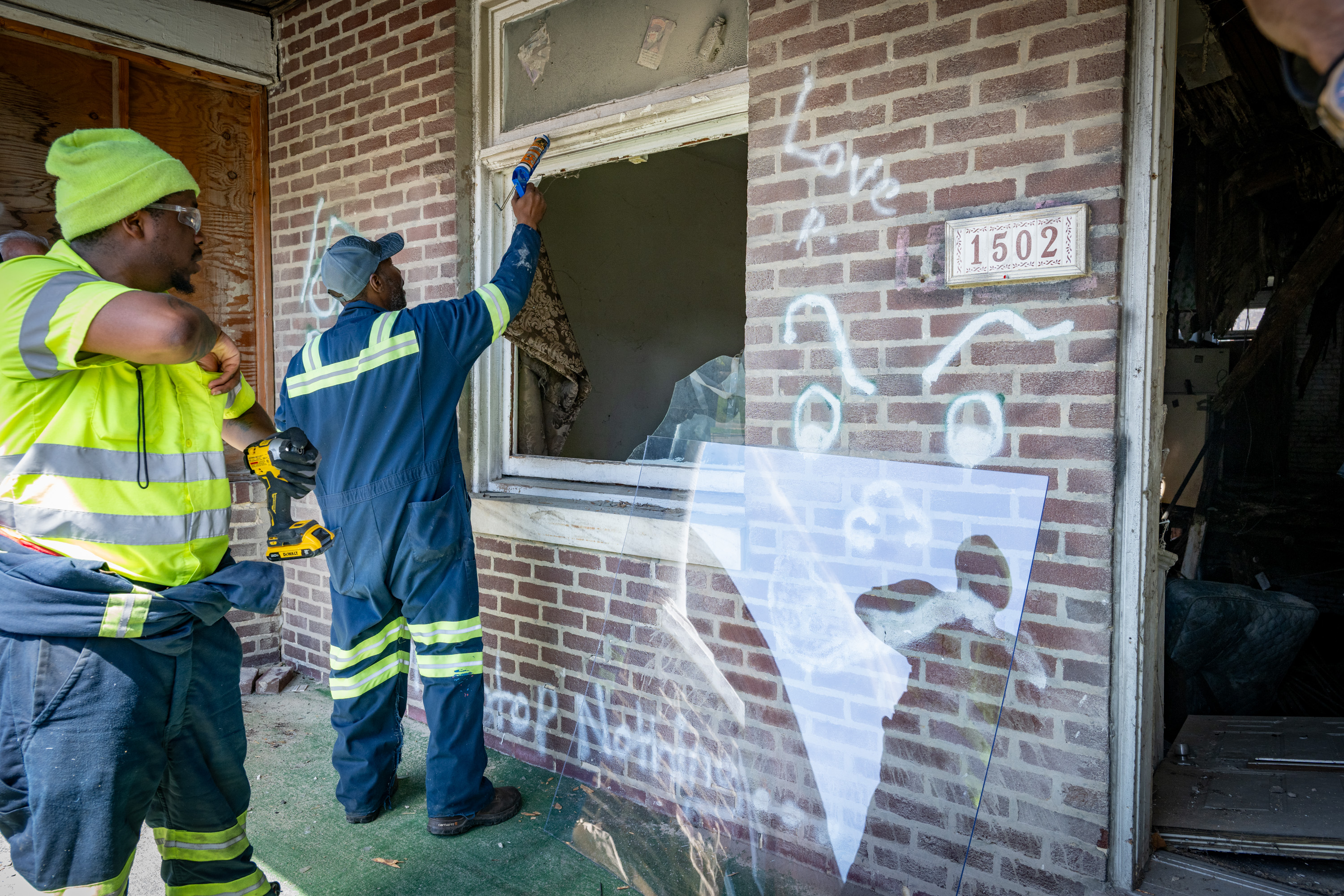 Why Baltimore is stripping plywood off its vacant homes