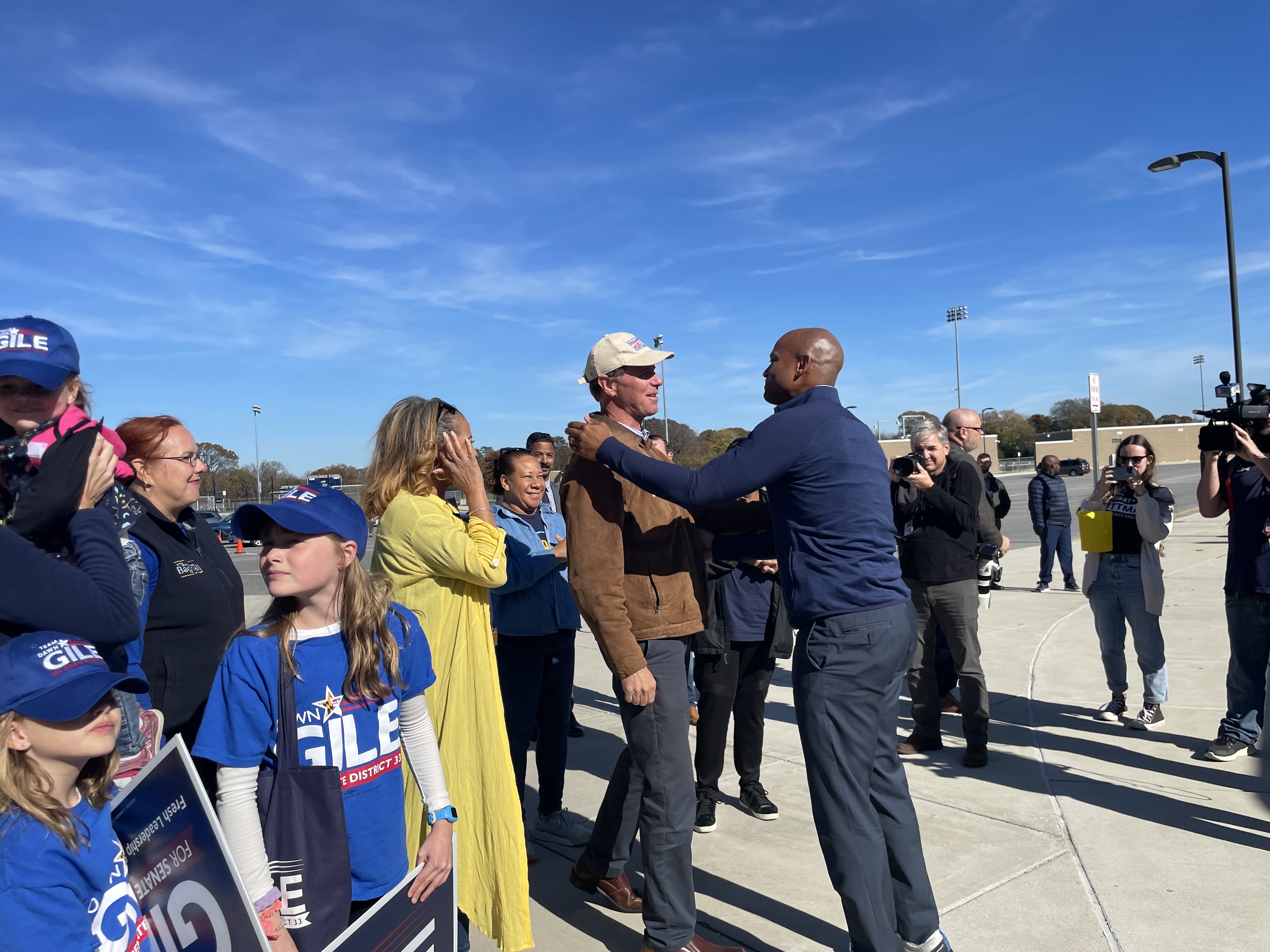 Democratic gubernatorial candidate Wes Moore and Anne Arundel County Executive Steuart Pittman outside Severna Park High School on Election Day.
