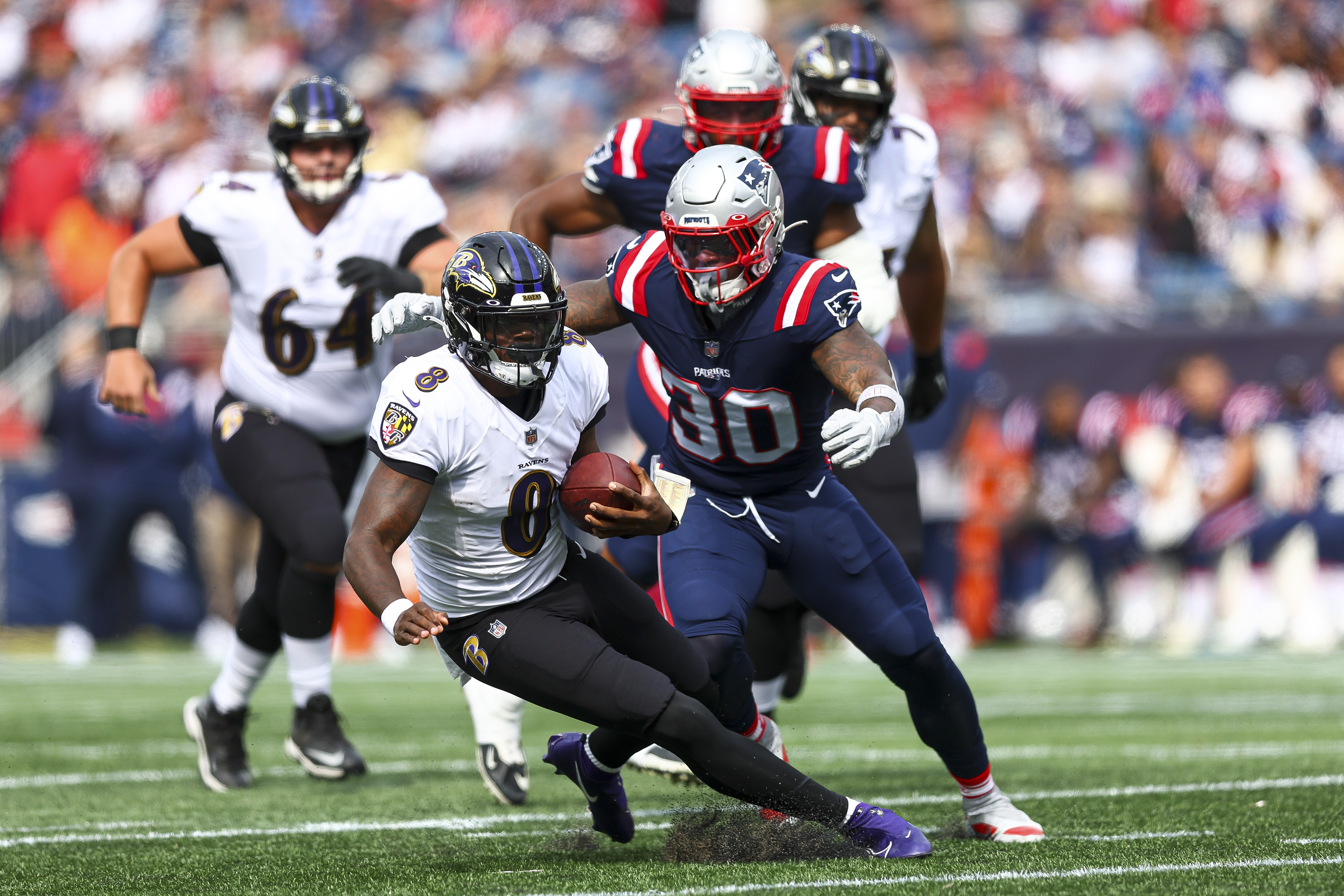 Jackson goes for 5 TDs, Ravens hold off Patriots 37-26