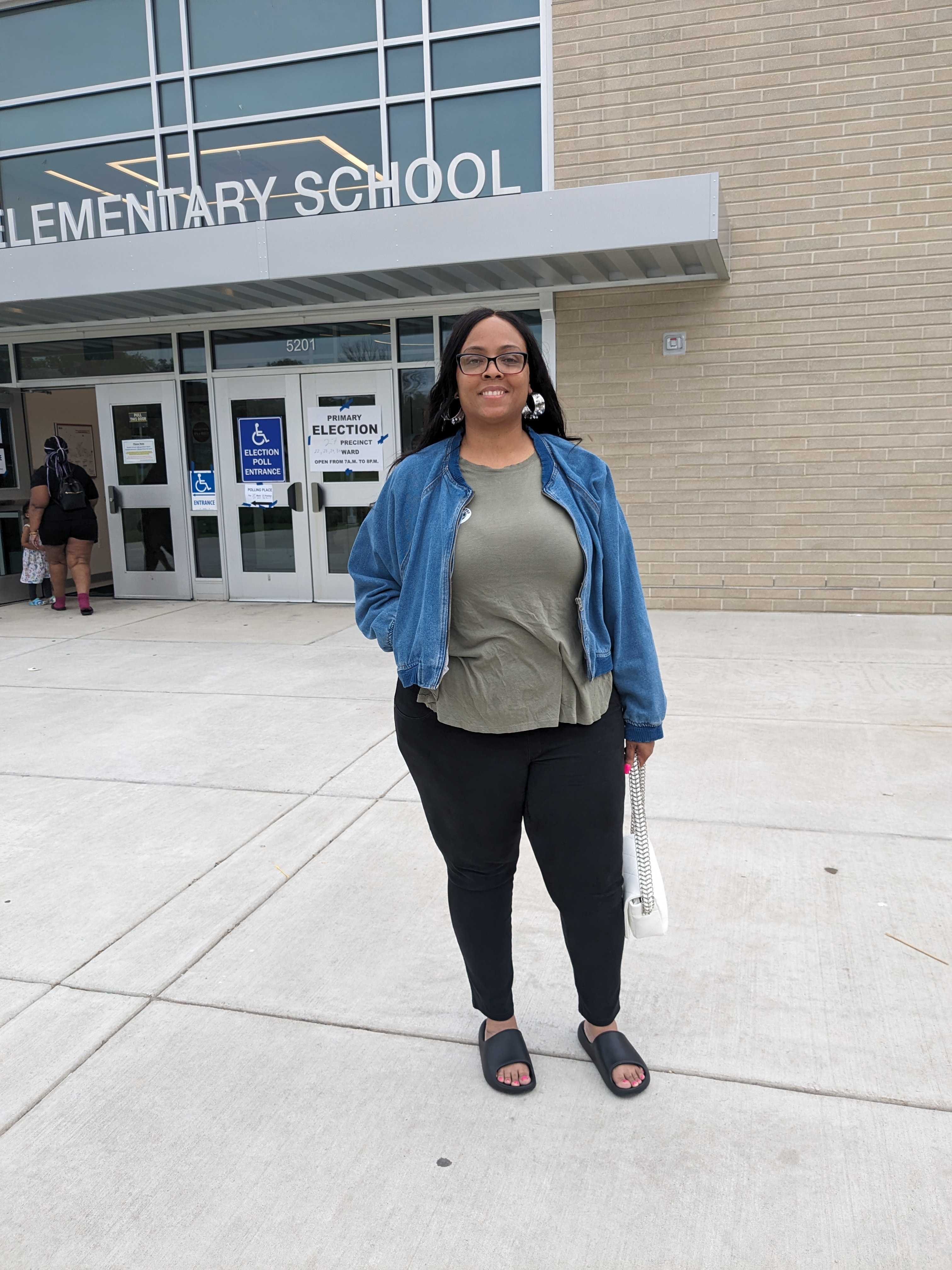 Yolanda Curtis outside the polling location at Northwood Elementary School in Baltimore. (Giacomo Bologna/The Baltimore Banner)