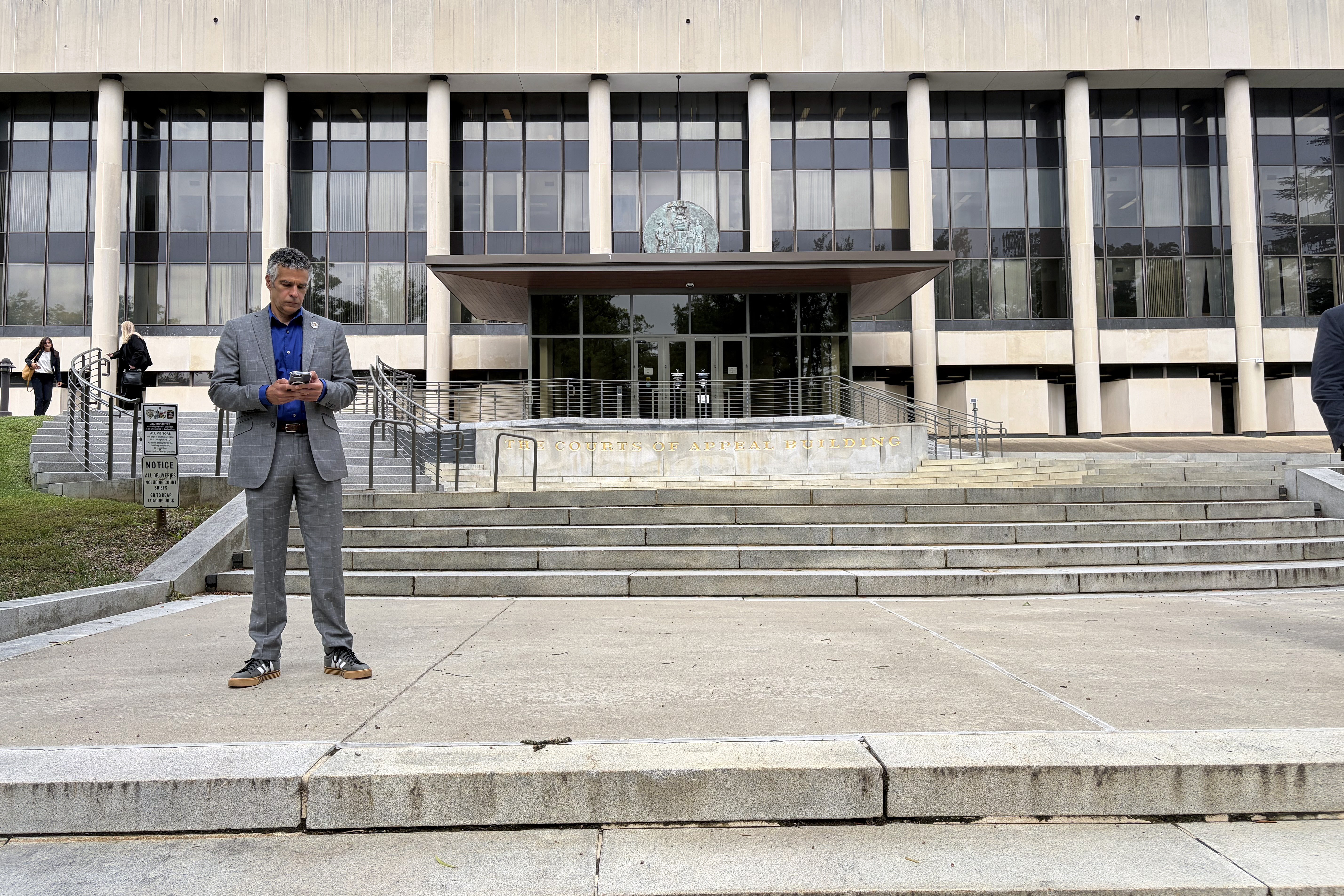 Jared DeMarinis, state administrator of elections, waits outside the Supreme Court of Maryland in Annapolis following oral arguments in a redistricting case on Thursday, Sept. 3, 2026.