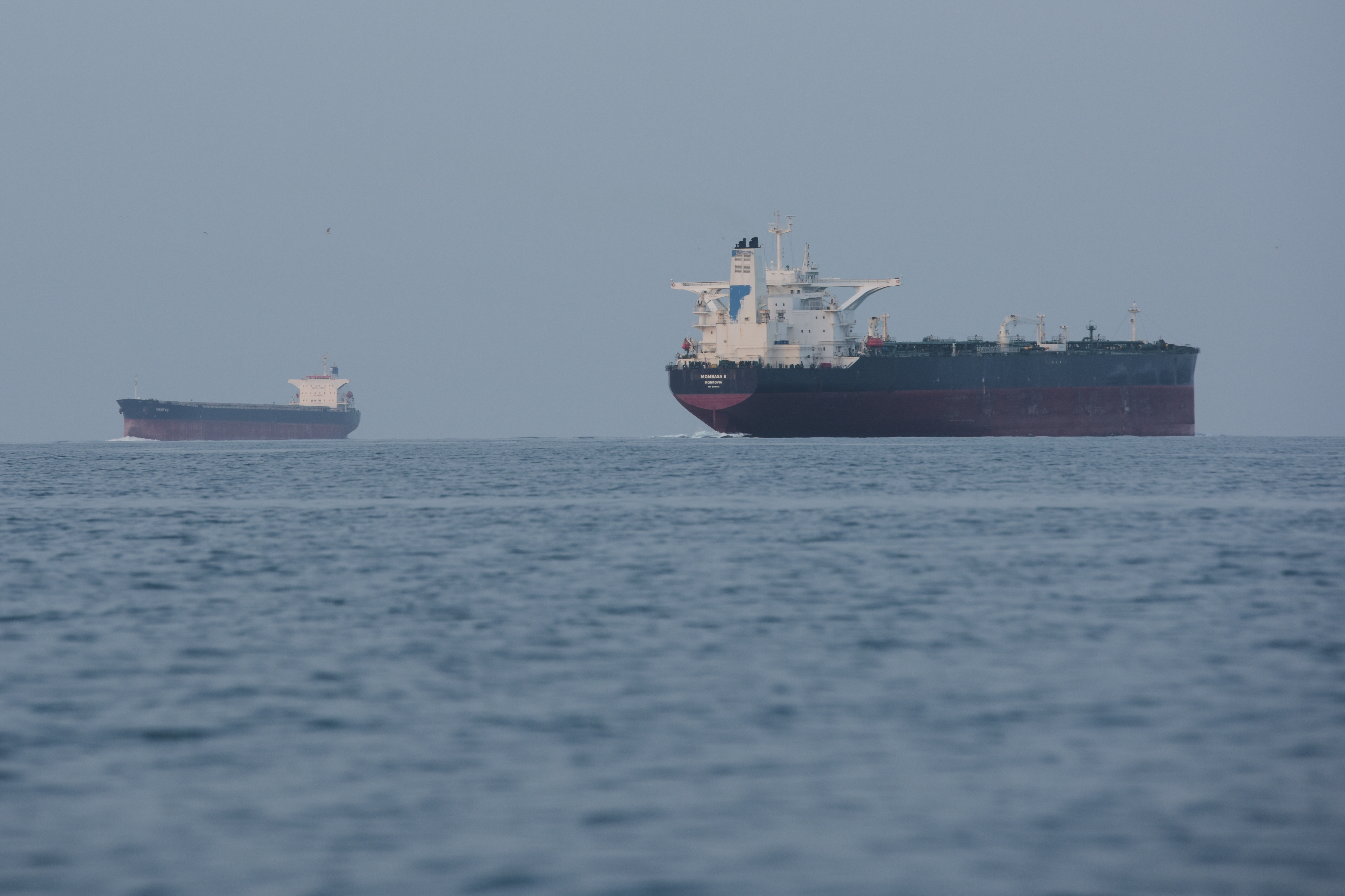 US claims progress in reopening the Strait of Hormuz, saying 2 merchant  ships have transited - The Banner